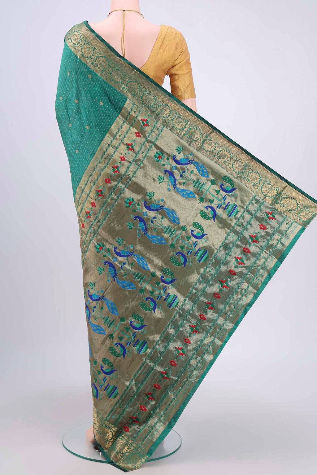 Flat view of Sea Green Blended Bangalore Silk Saree with Jacquard With Zari Butta on the body and Zari Border. 