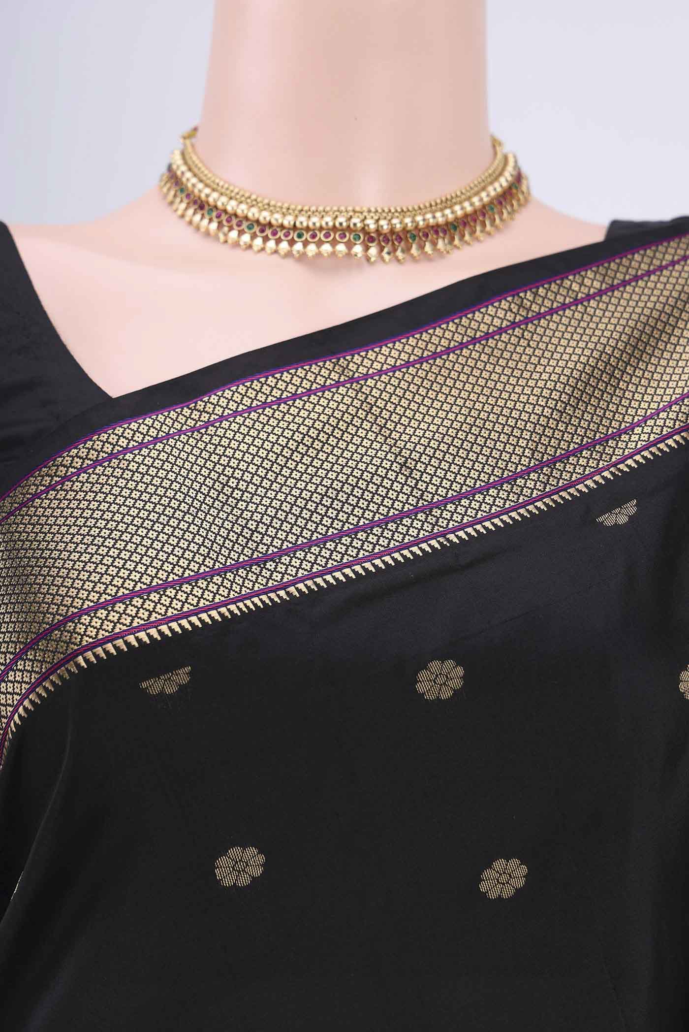 Border image of Black Blended Bangalore Silk Saree with Zari Butta on the body and Zari Border. 