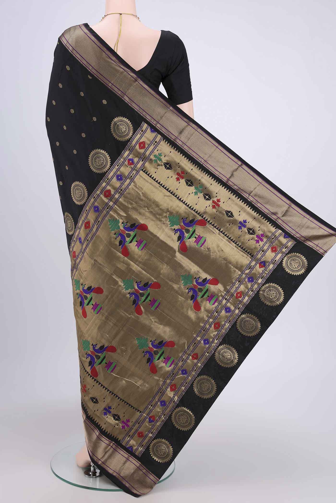 Flat view of Black Blended Bangalore Silk Saree with Zari Butta on the body and Zari Border. 
