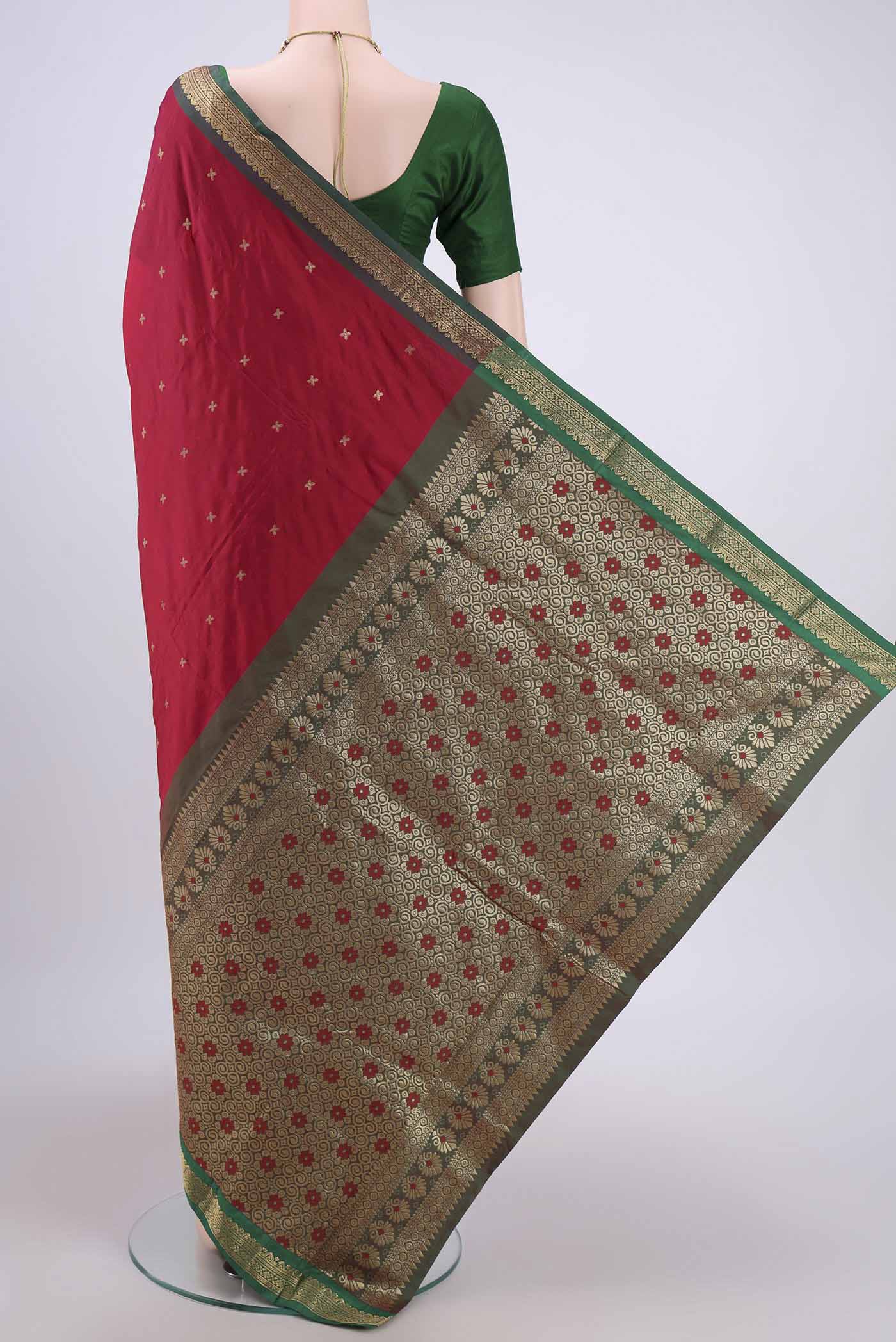 Flat view of Maroon Dual Tone Blended Bangalore Silk Saree with Zari Butta on the body and Zari Border. 