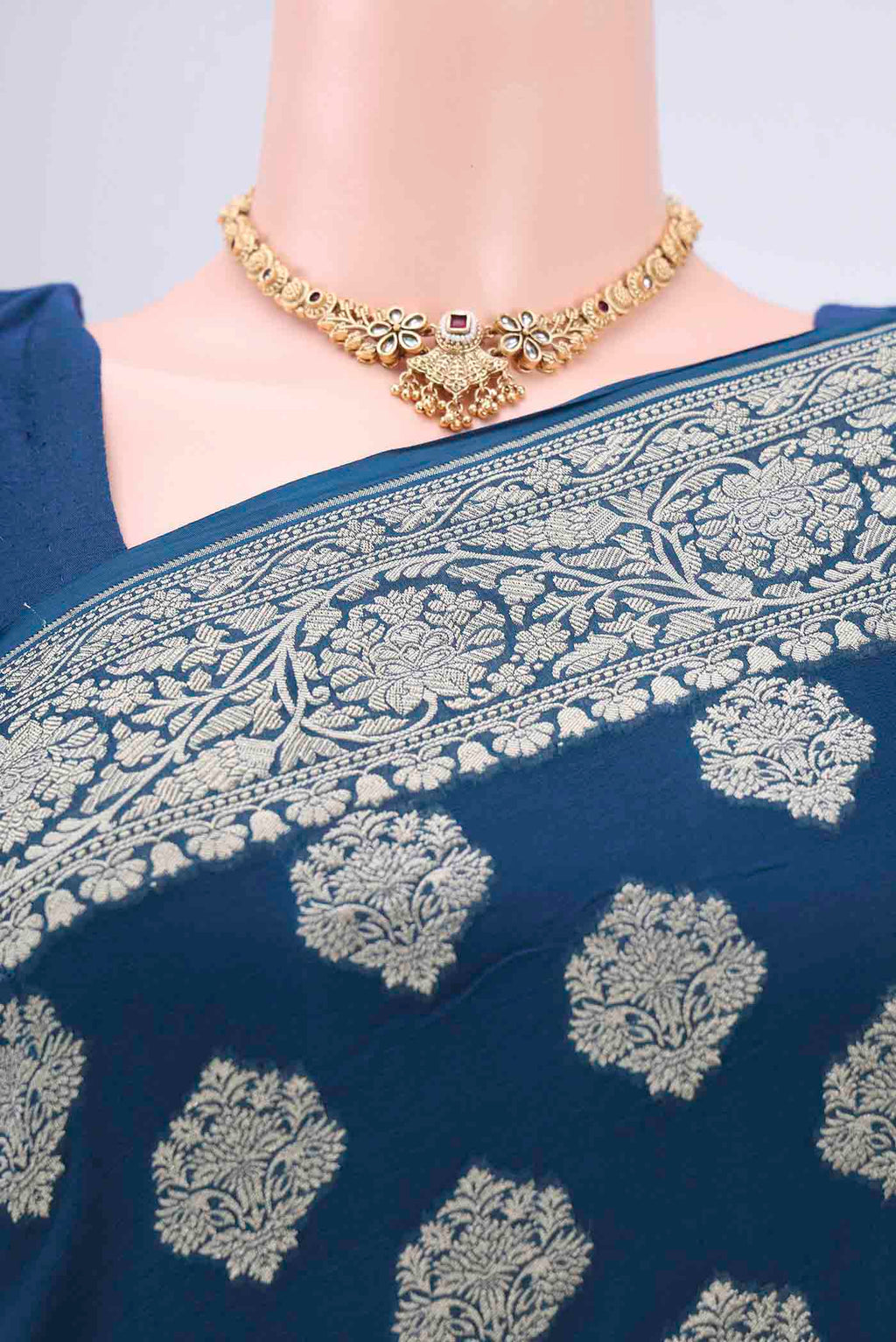 Border image of Blue Banarasi Georgette Saree with Zari Brocade on the body and Zari Border. 