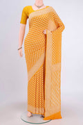 Yellow Banarasi Georgette Saree with Zari Brocade on the body and Zari Border.  displayed on a mannequin