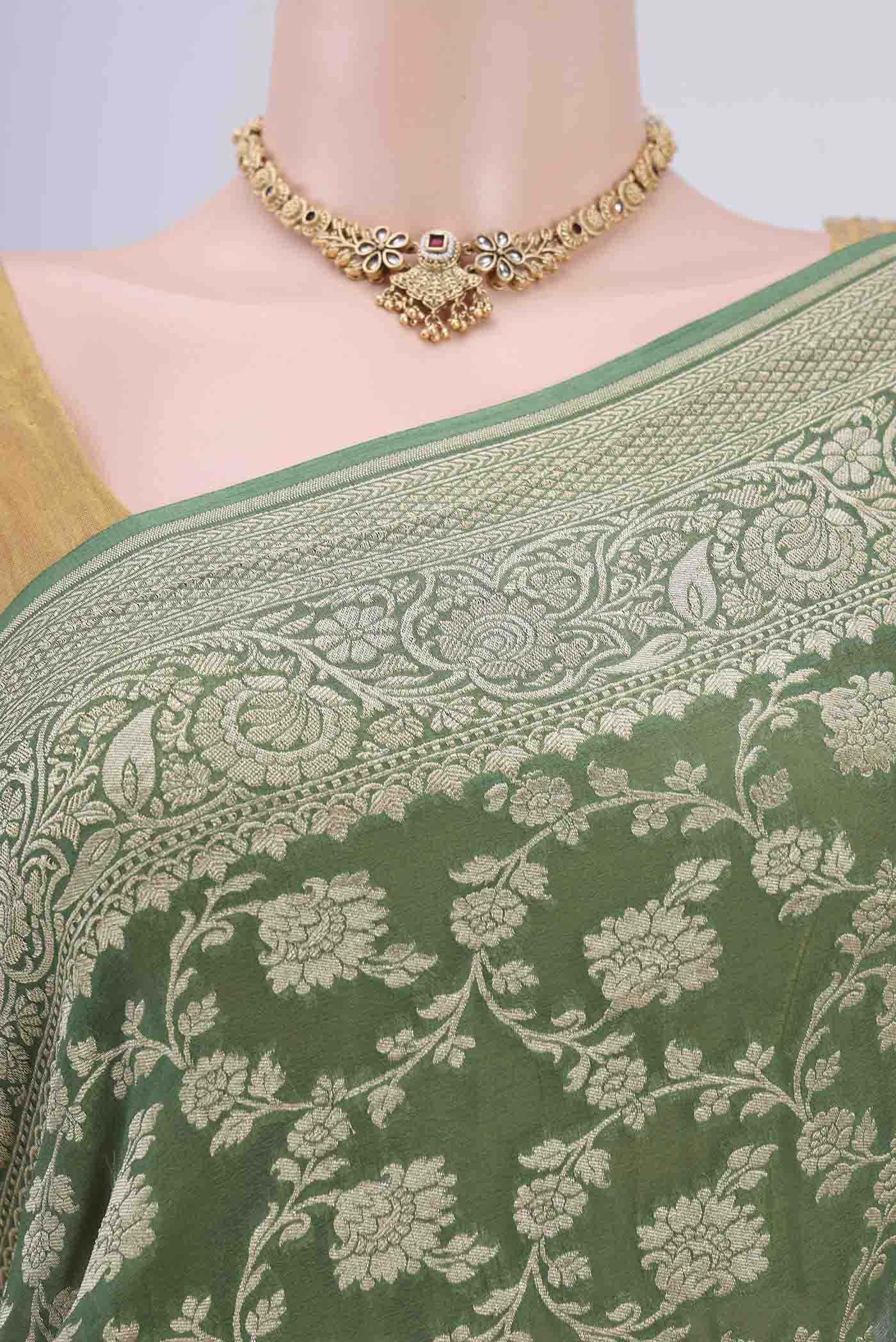 Border image of Light Green Banarasi Georgette Saree with Zari Brocade on the body and Zari Border. 