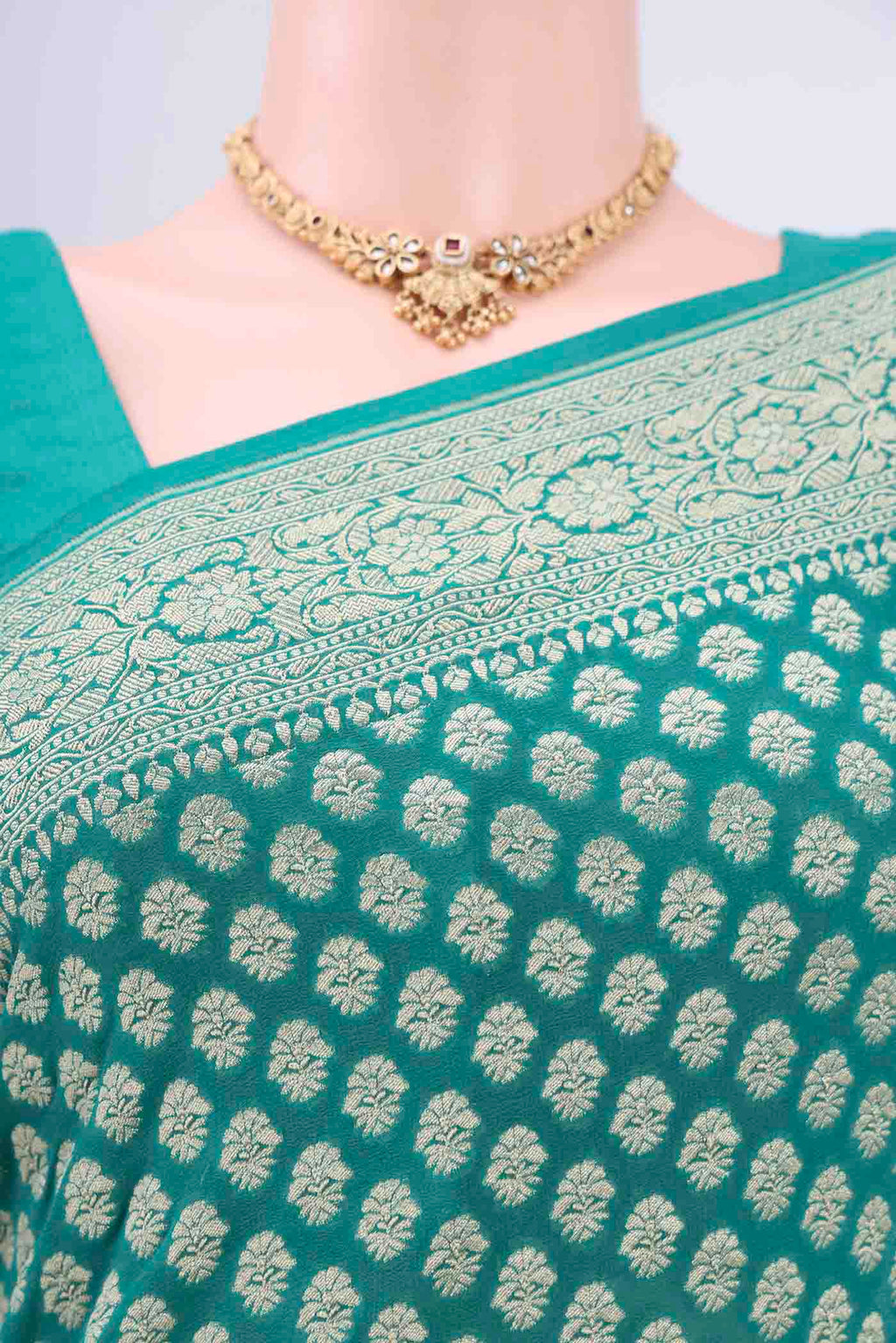 Border image of Sea Green Banarasi Georgette Saree with Zari Brocade on the body and Zari Border. 