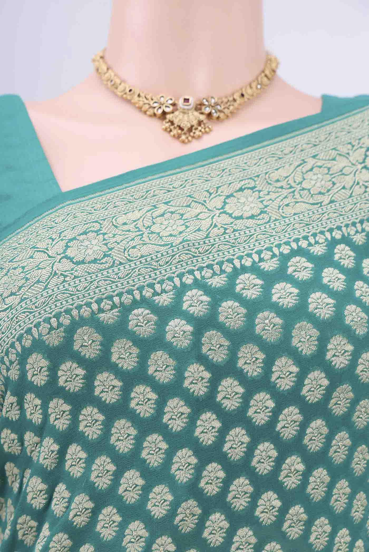 Border image of Sea Green Banarasi Georgette Saree with Zari Brocade on the body and Zari Border. 