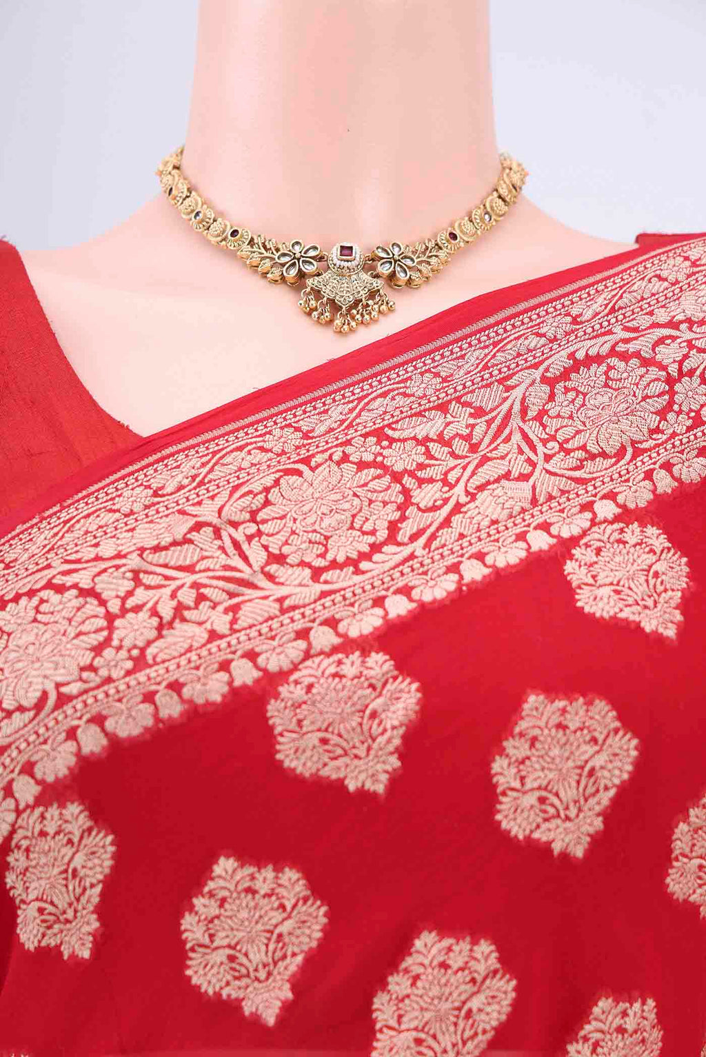 Border image of Red Banarasi Georgette Saree with Zari Brocade on the body and Zari Border. 