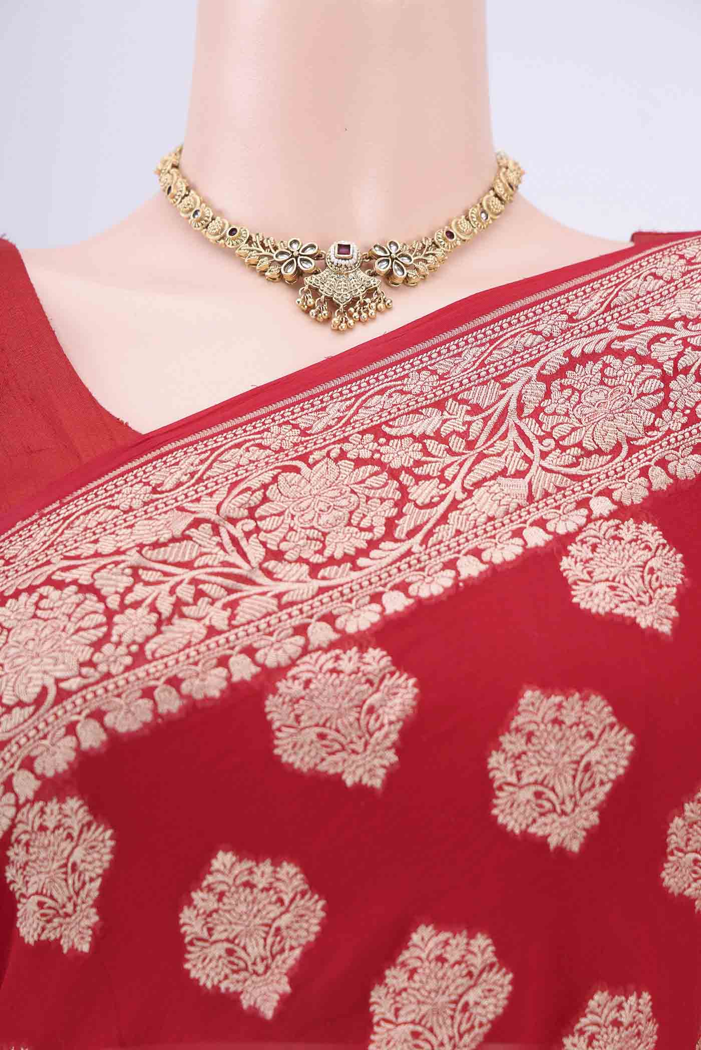 Border image of Red Banarasi Georgette Saree with Zari Brocade on the body and Zari Border. 