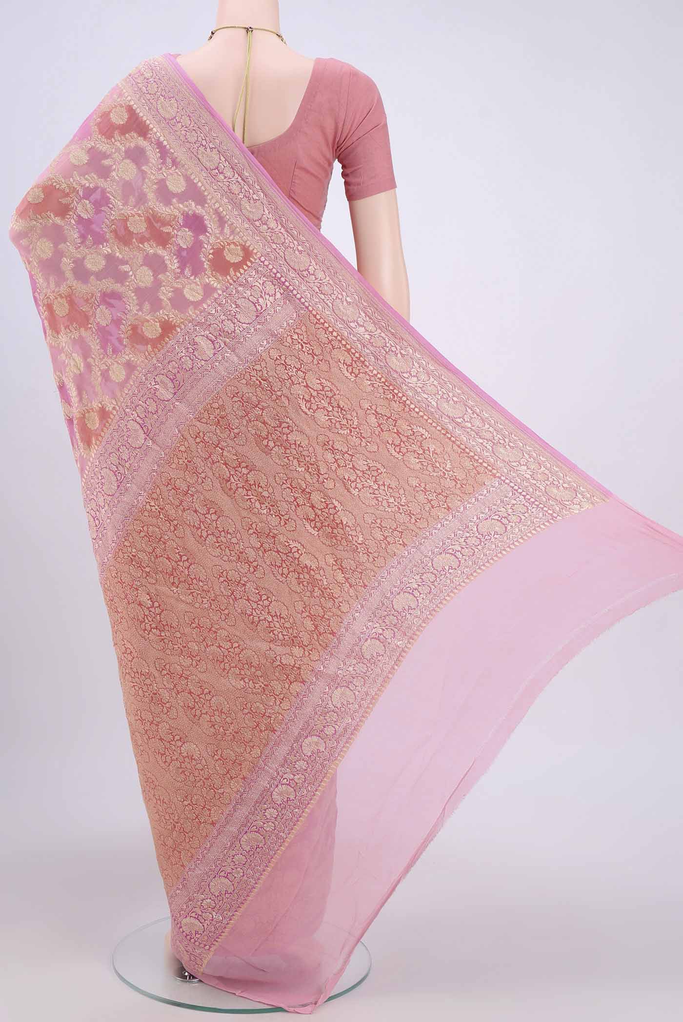 Flat view of Pink Banarasi Georgette Saree with Zari Brocade on the body and Zari Border. 