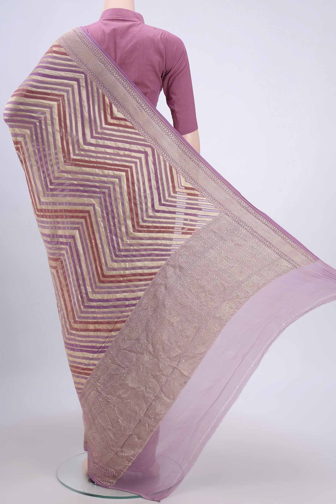 Flat view of Mauve Banarasi Georgette Saree with Zari Brocade on the body and Zari Border. 