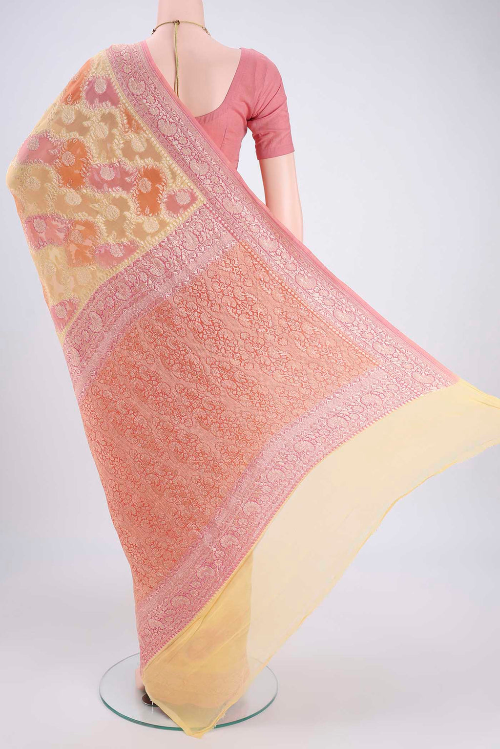 Flat view of Multi Color Banarasi Georgette Saree with Zari Brocade on the body and Zari Border. 