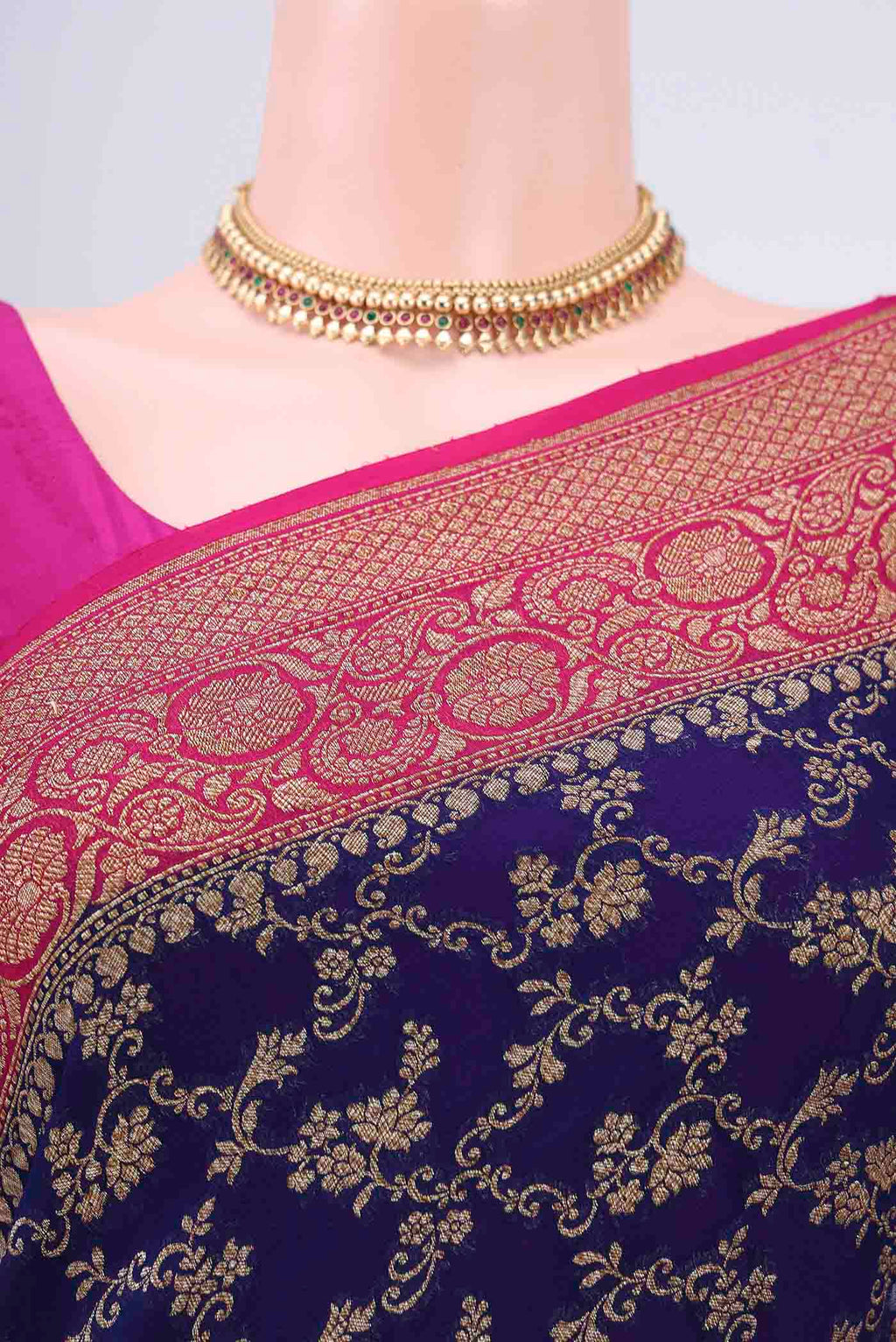 Border image of Navy Blue Banarasi Georgette Saree with Zari Brocade on the body and Zari Border. 