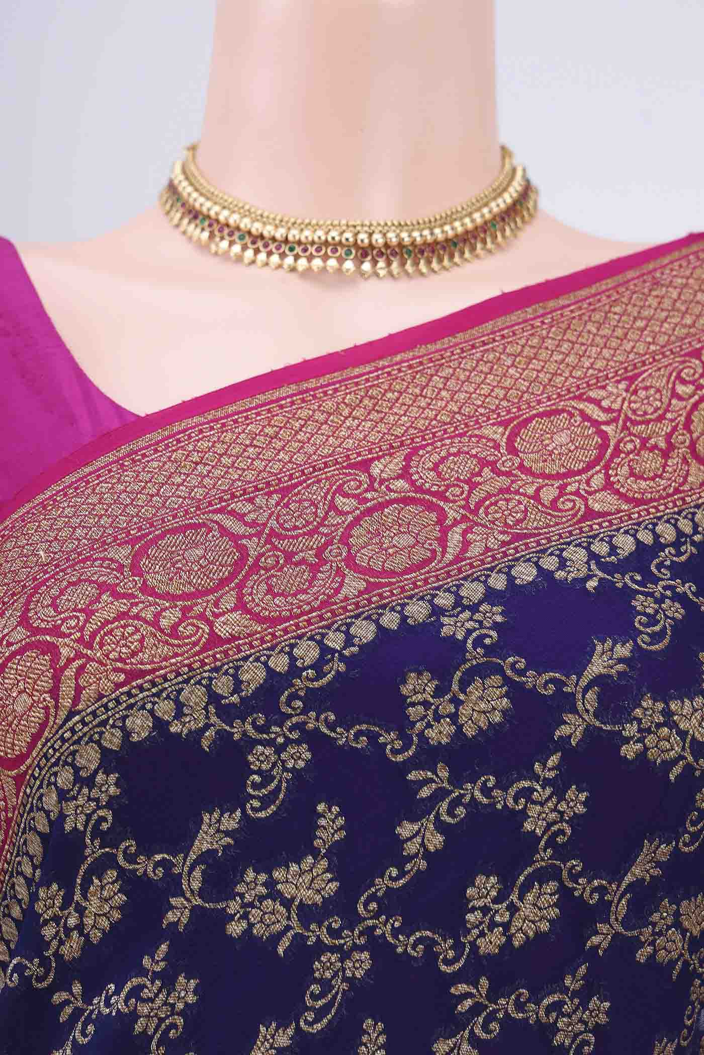 Border image of Navy Blue Banarasi Georgette Saree with Zari Brocade on the body and Zari Border. 