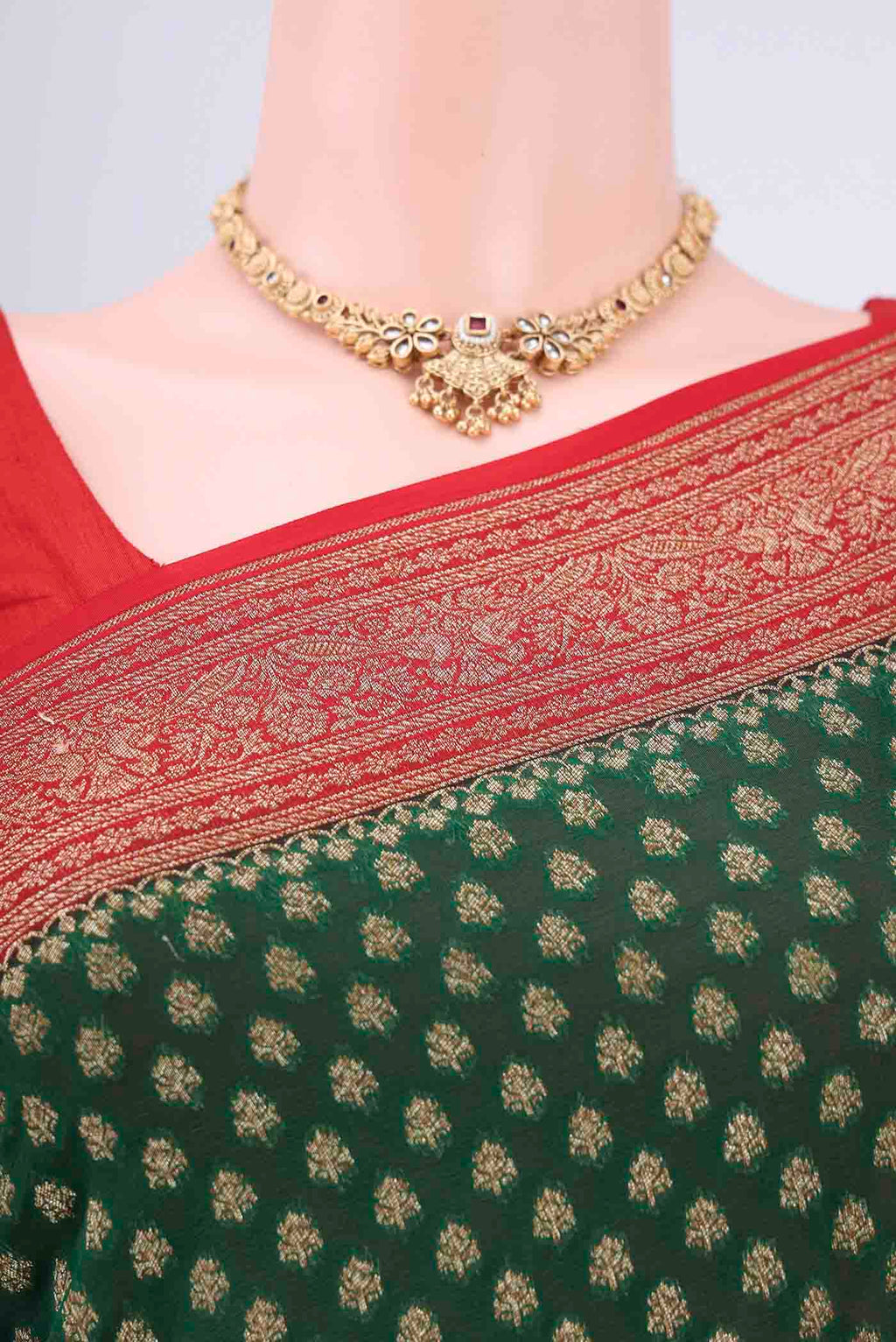 Border image of Bottle Green Banarasi Georgette Saree with Zari Brocade on the body and Zari Border. 