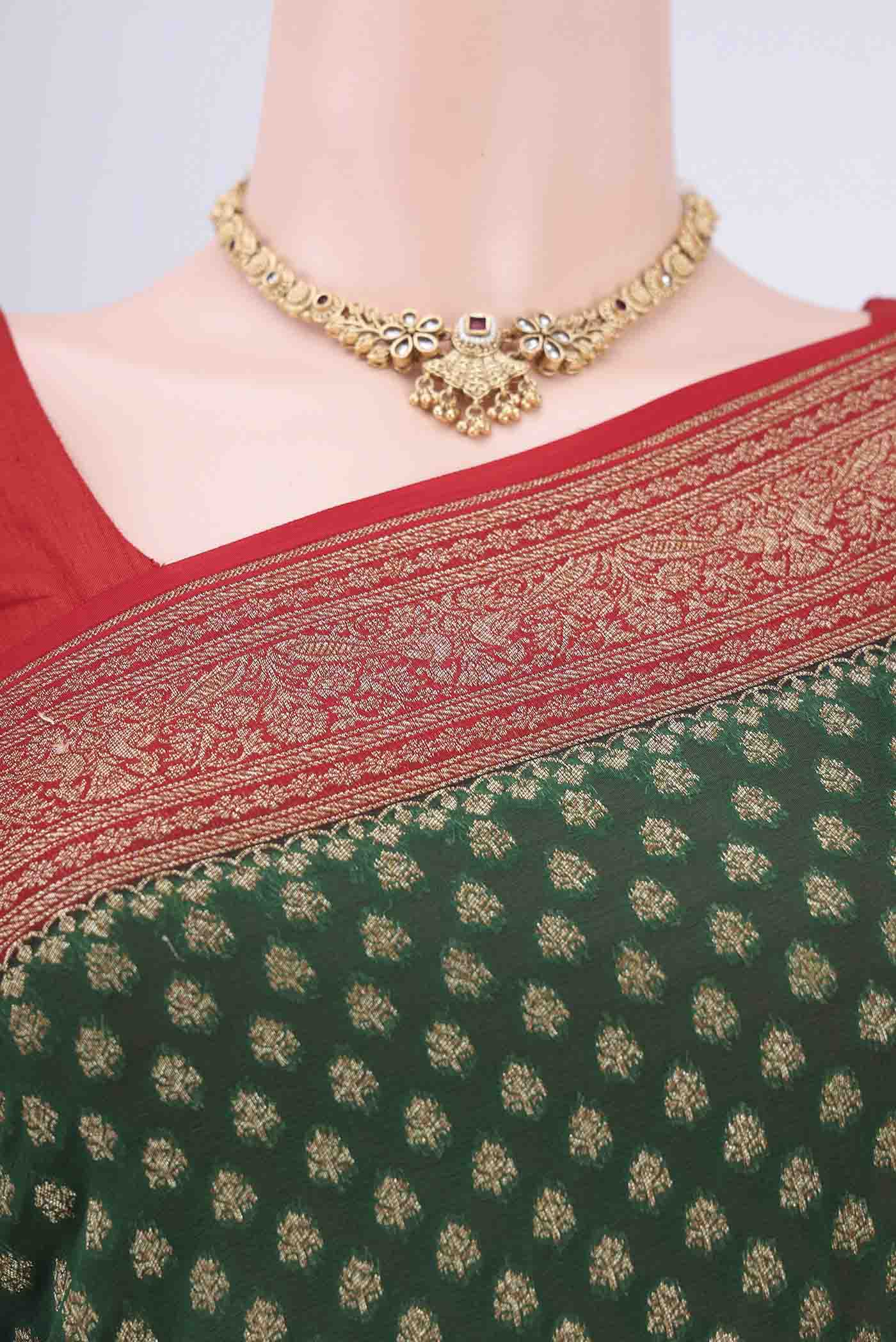 Border image of Bottle Green Banarasi Georgette Saree with Zari Brocade on the body and Zari Border. 