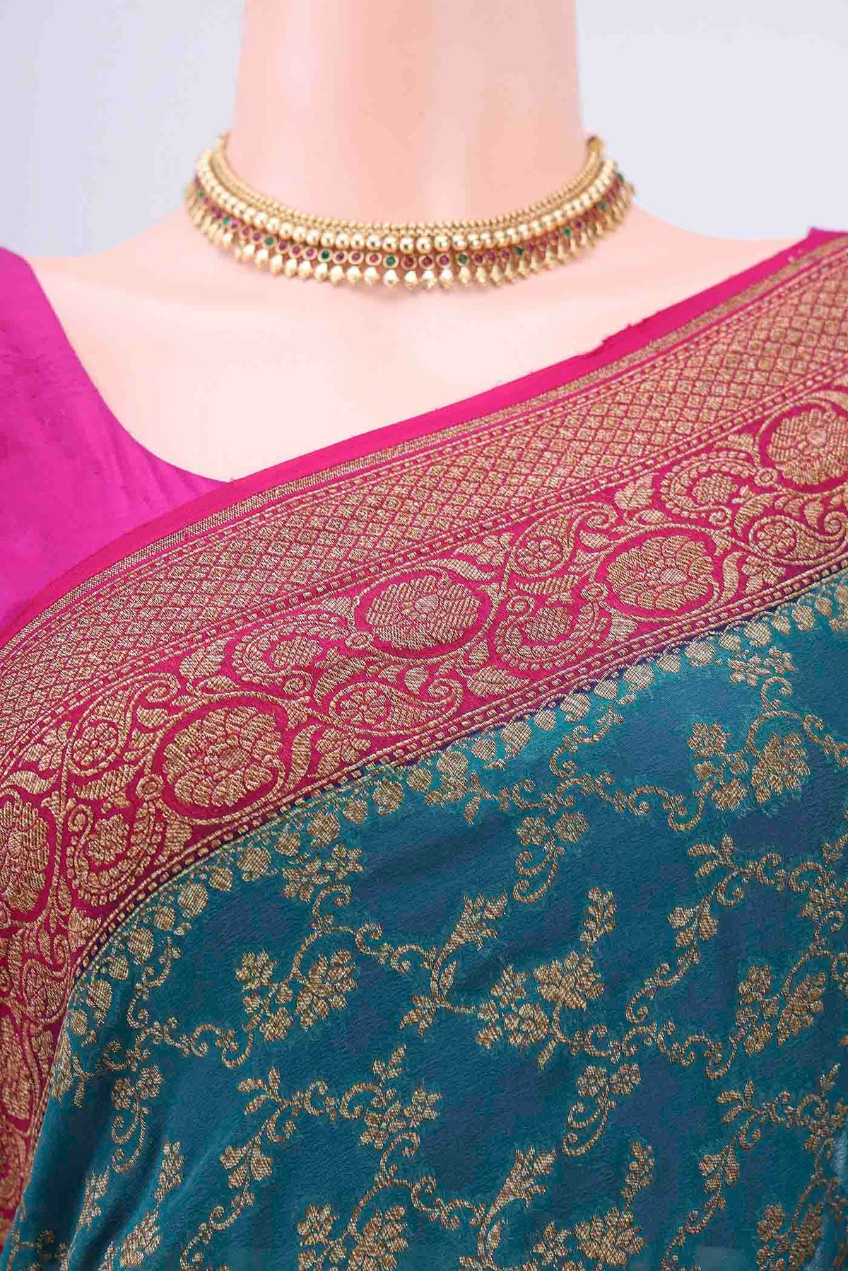 Border image of Sea Green Banarasi Georgette Saree with Zari Brocade on the body and Zari Border. 