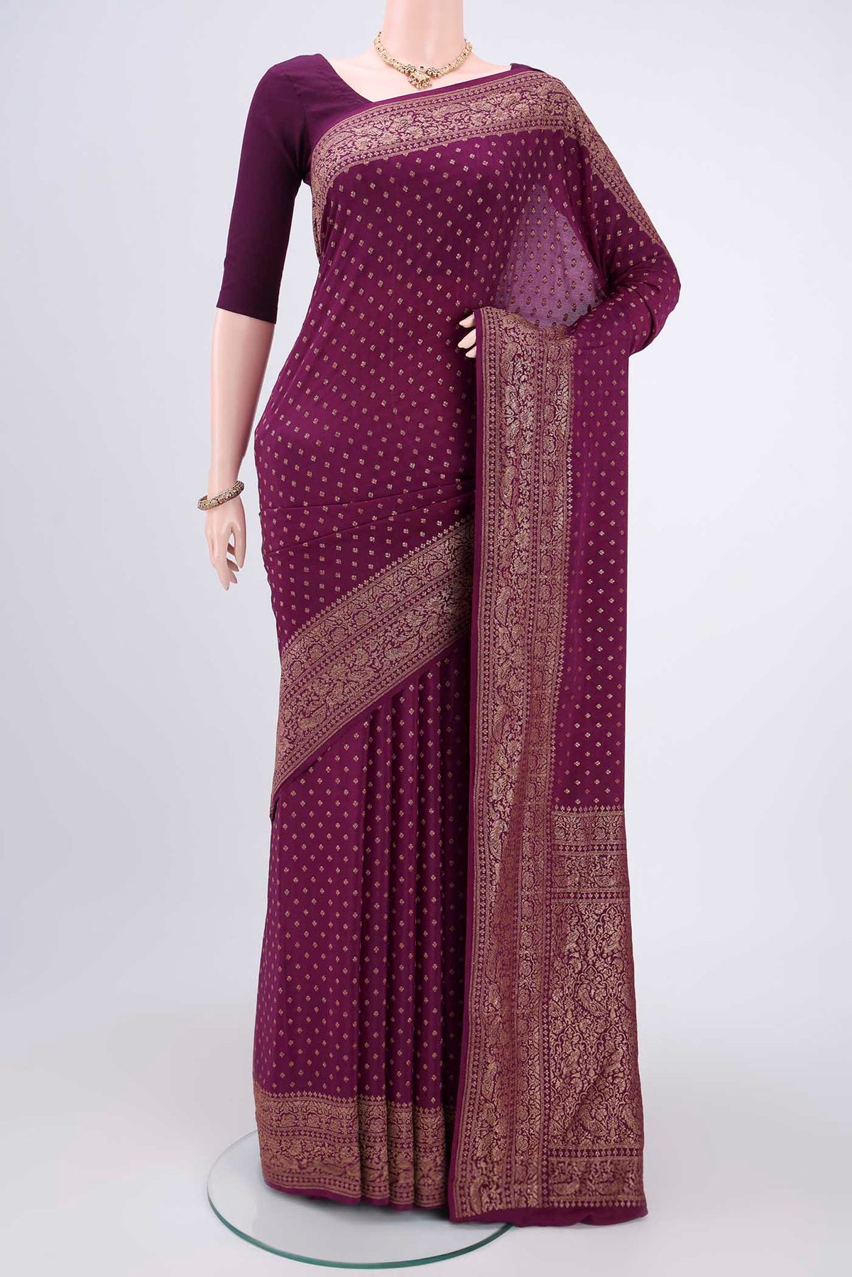 Purple Banarasi Georgette Saree with Zari Brocade on the body and Zari Border.  displayed on a mannequin