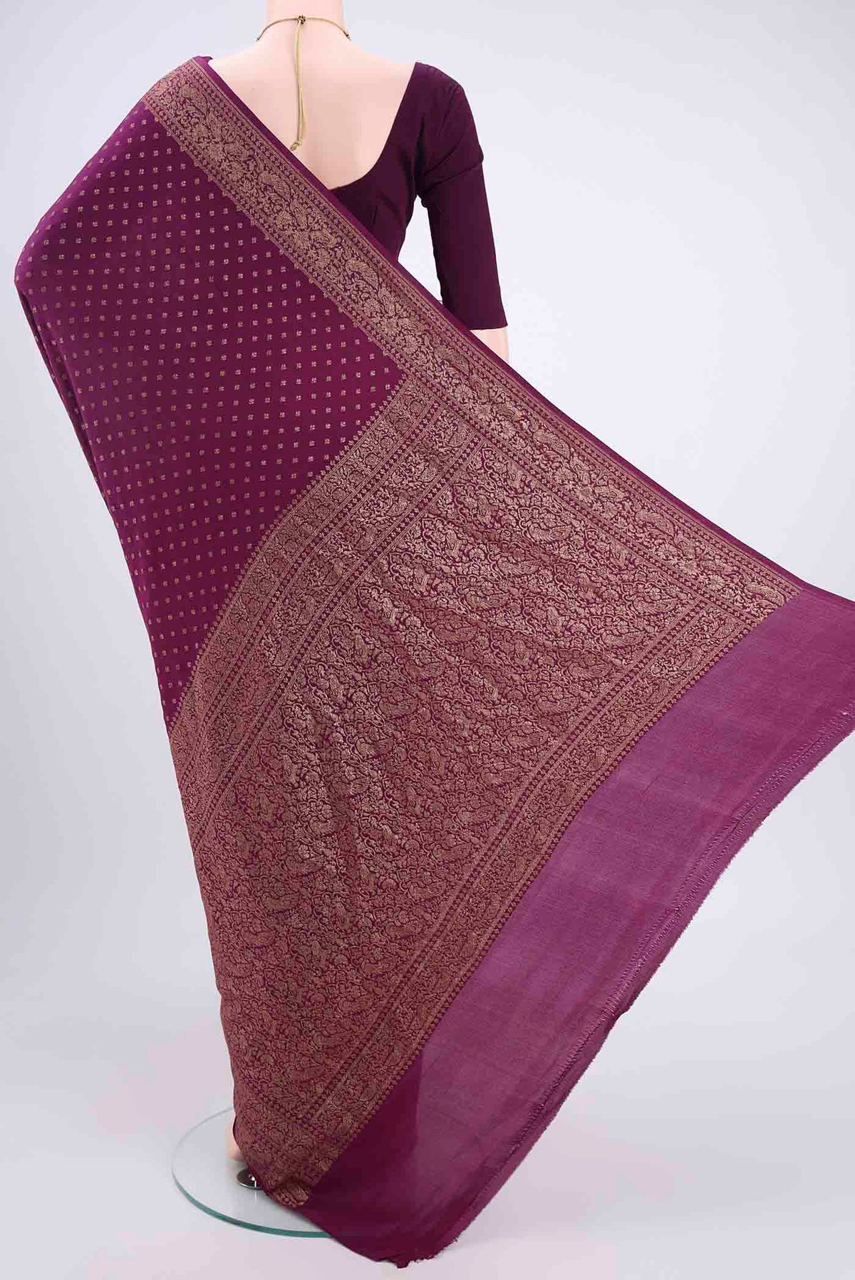 Flat view of Purple Banarasi Georgette Saree with Zari Brocade on the body and Zari Border. 