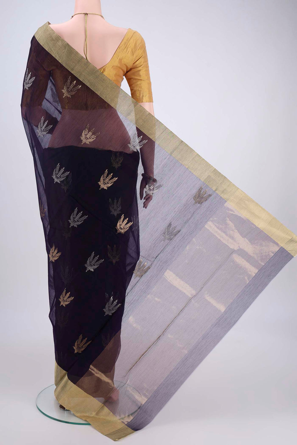 Flat view of Navy Blue Chanderi Silk Cotton Saree with Zari Butta on the body and Zari Border. 