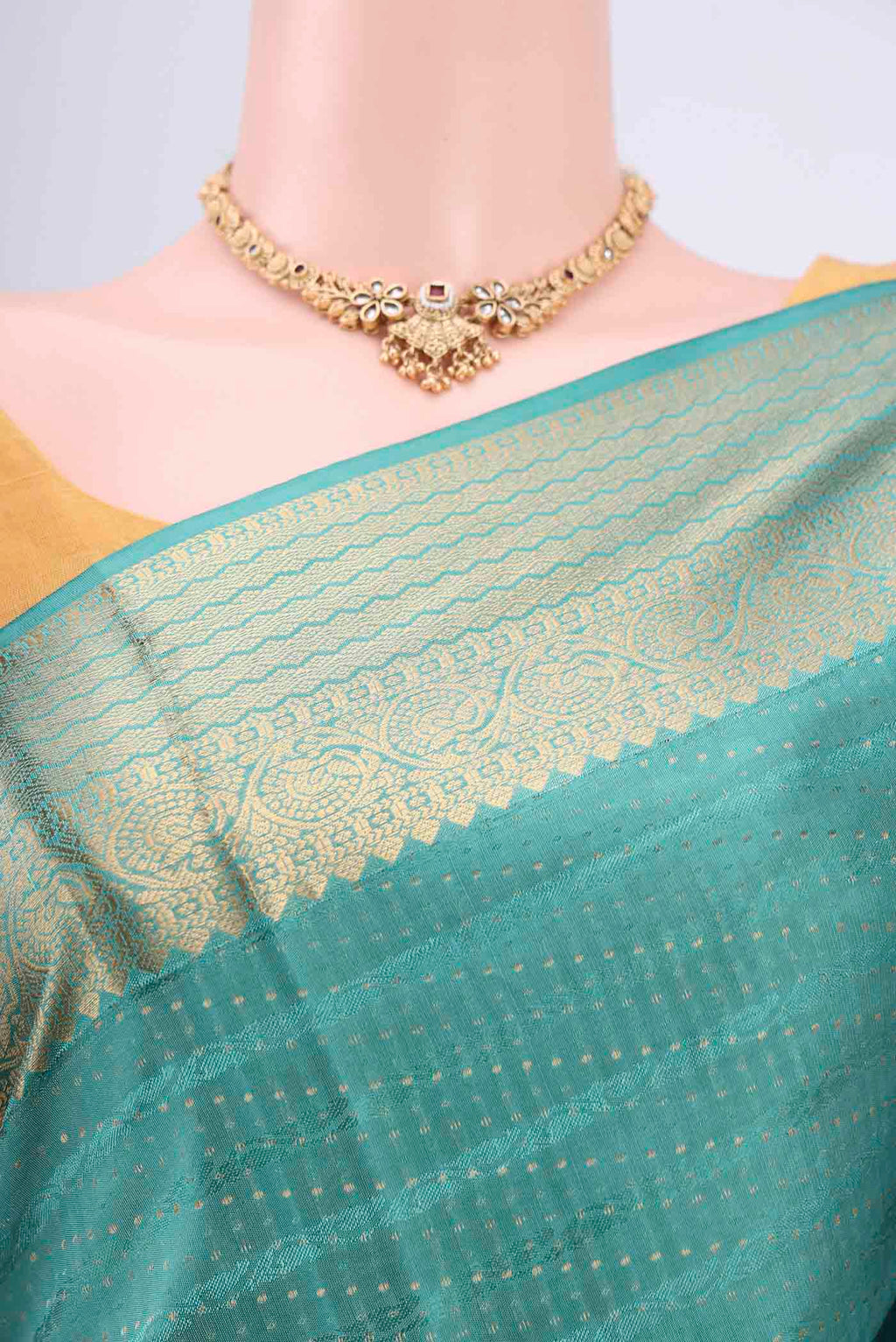 Border image of Sage Green Soft Silk Saree with Jacquard With Zari Butta on the body and Zari Border. 