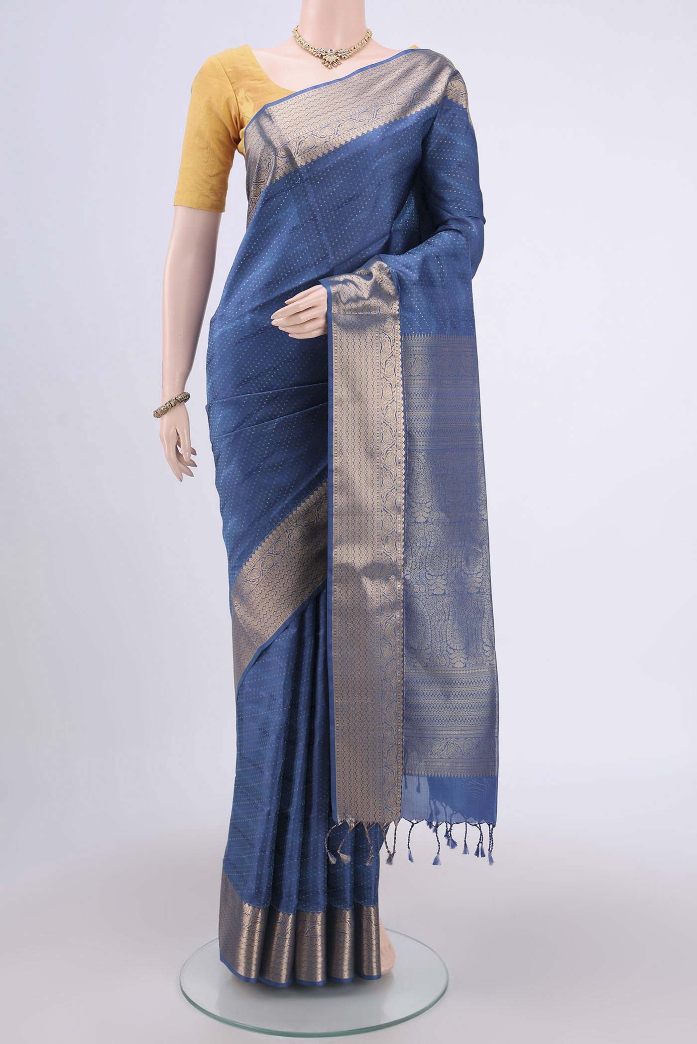 Blue Soft Silk Saree with Jacquard With Zari Butta on the body and Zari Border.  displayed on a mannequin