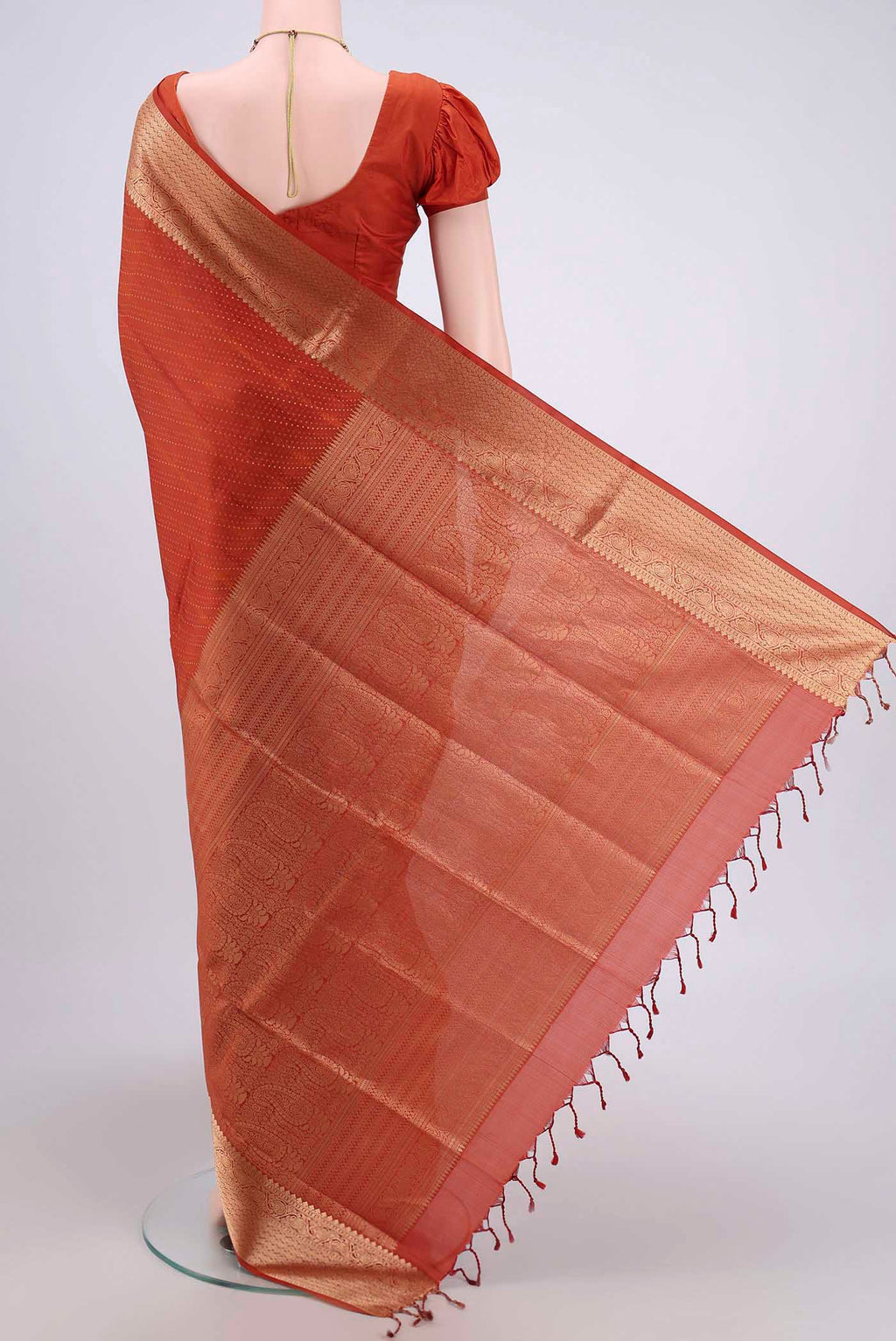 Flat view of Mustard Soft Silk Saree with Jacquard With Zari Butta on the body and Zari Border. 