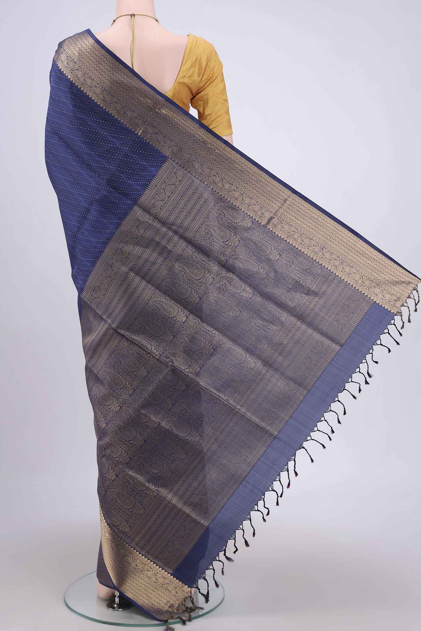 Flat view of Navy Blue Soft Silk Saree with Jacquard With Zari Butta on the body and Zari Border. 