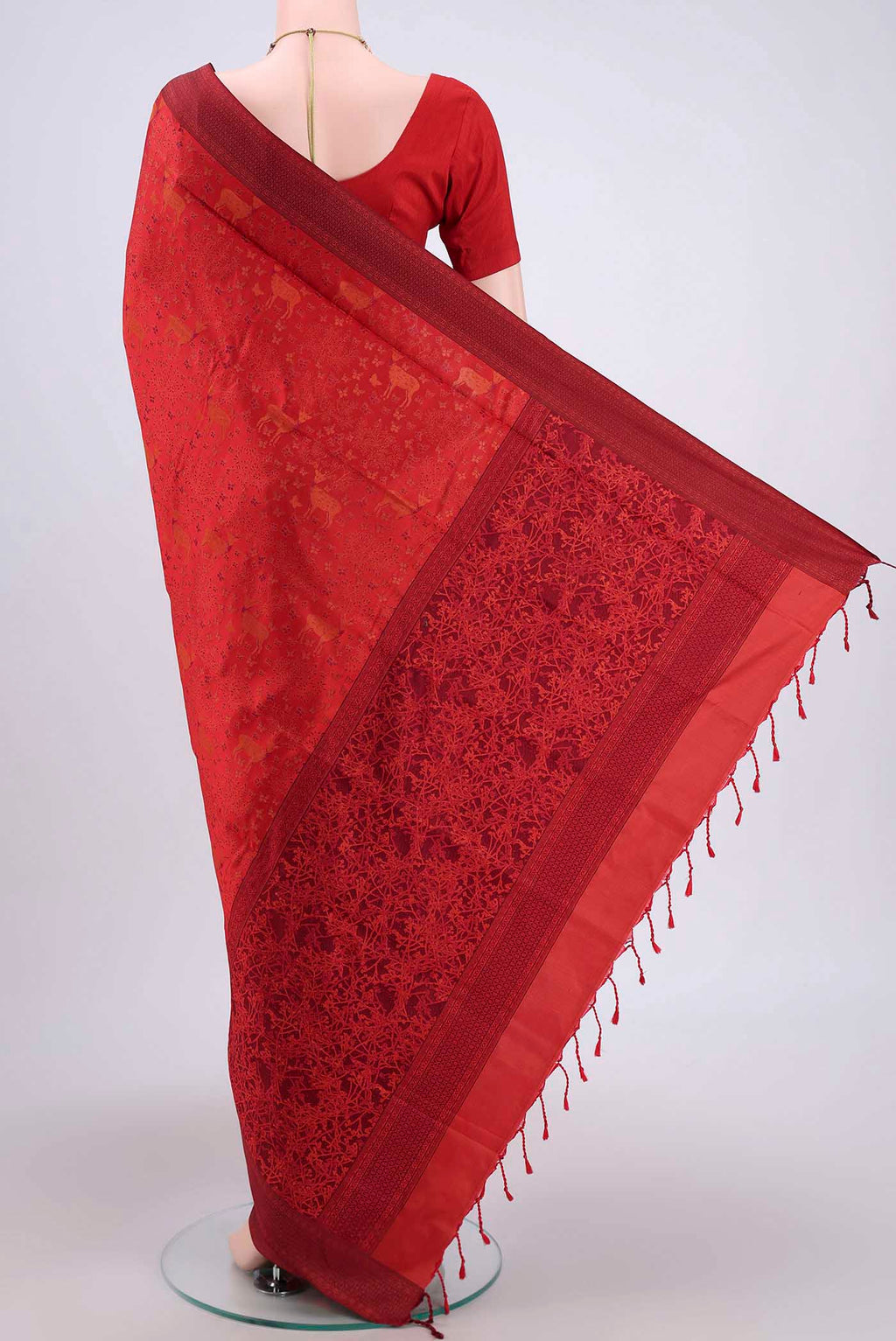 Flat view of Red Soft Silk Saree with Jacquard design on the body and Thread Border. 