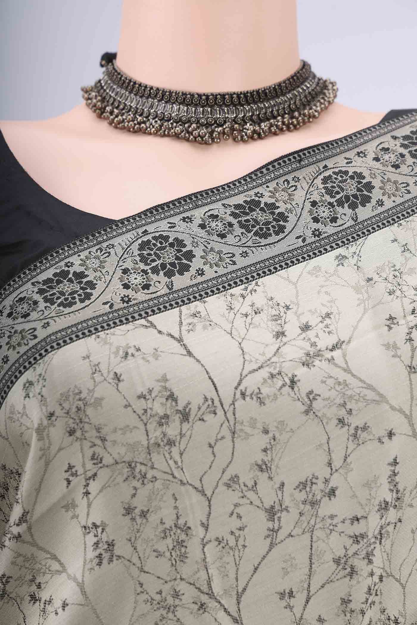 Border image of Davys Grey Soft Silk Saree with Jacquard design on the body and Thread Border. 