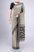 Davys Grey Soft Silk Saree with Jacquard design on the body and Thread Border.  displayed on a mannequin