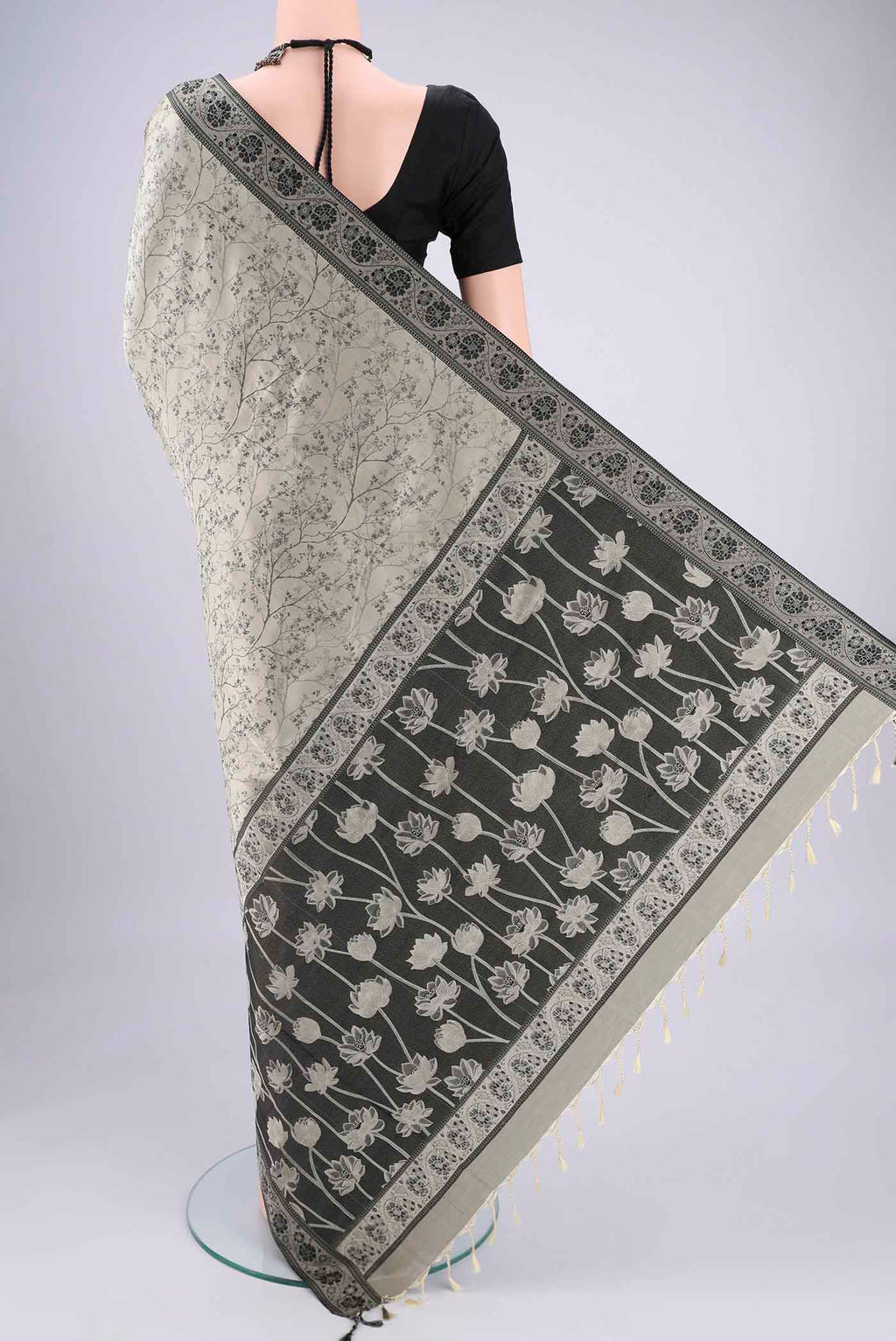 Flat view of Davys Grey Soft Silk Saree with Jacquard design on the body and Thread Border. 