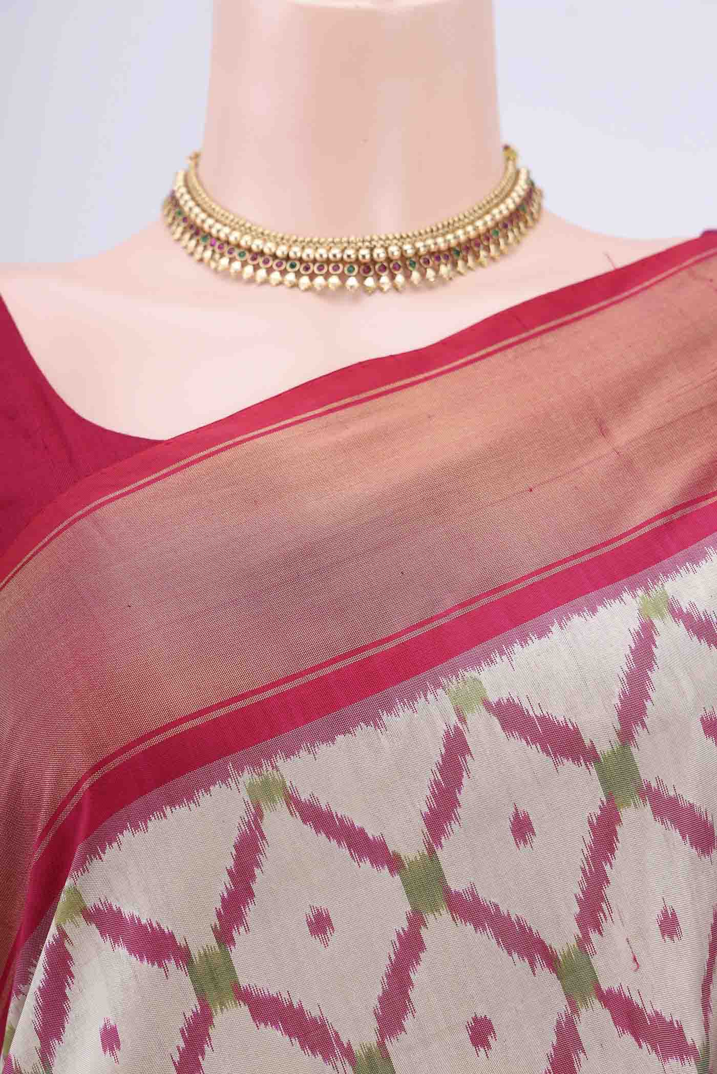 Border image of Beige Pochampally Silk Saree with Pure Ikat on the body and Zari Border. 
