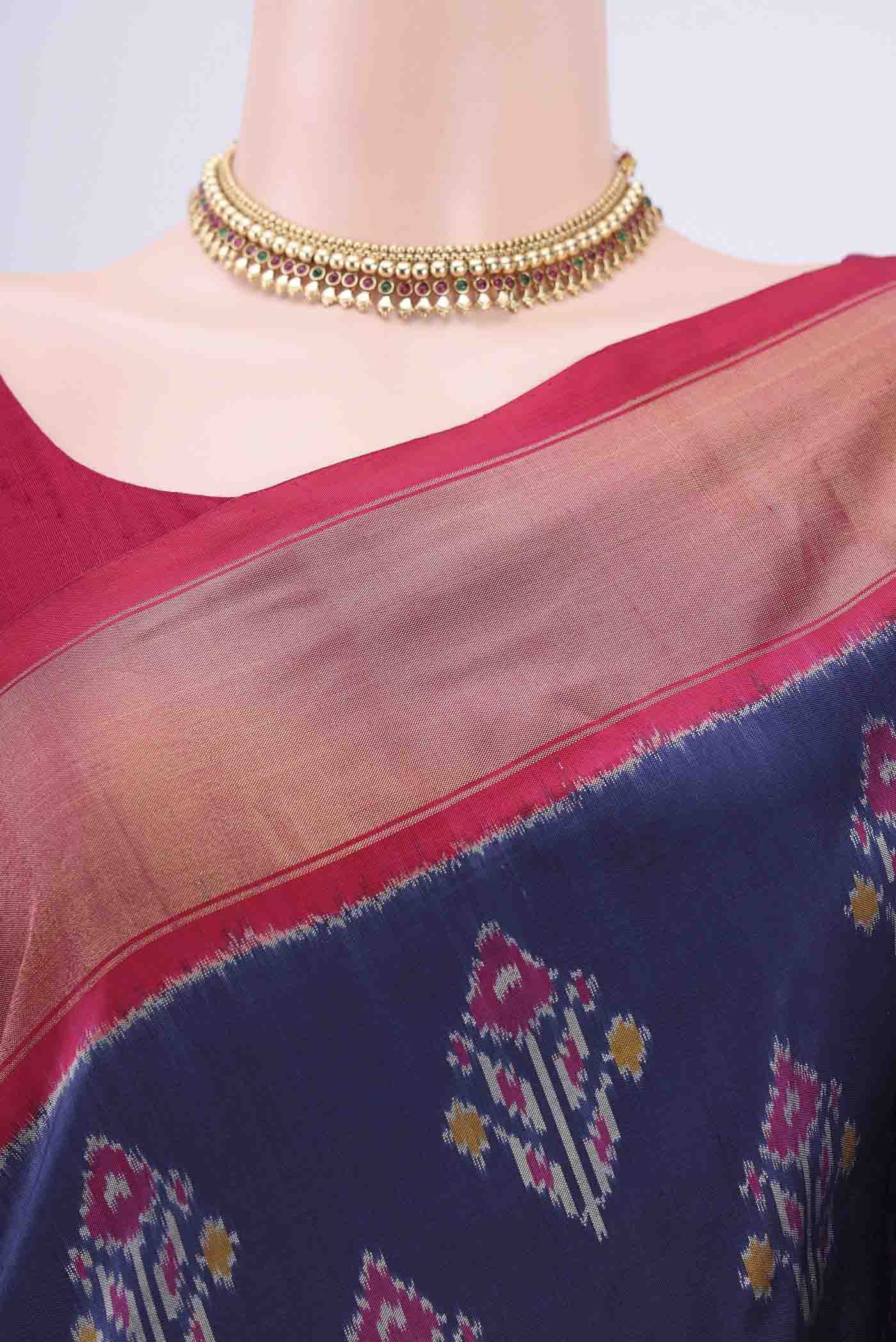 Border image of Navy Blue Pochampally Silk Saree with Pure Ikat on the body and Zari Border. 
