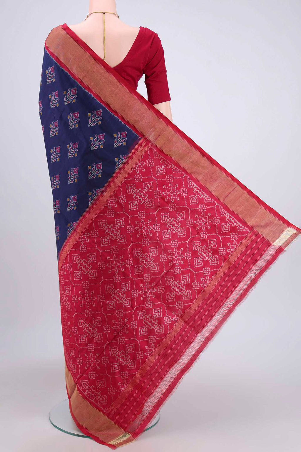 Flat view of Navy Blue Pochampally Silk Saree with Pure Ikat on the body and Zari Border. 