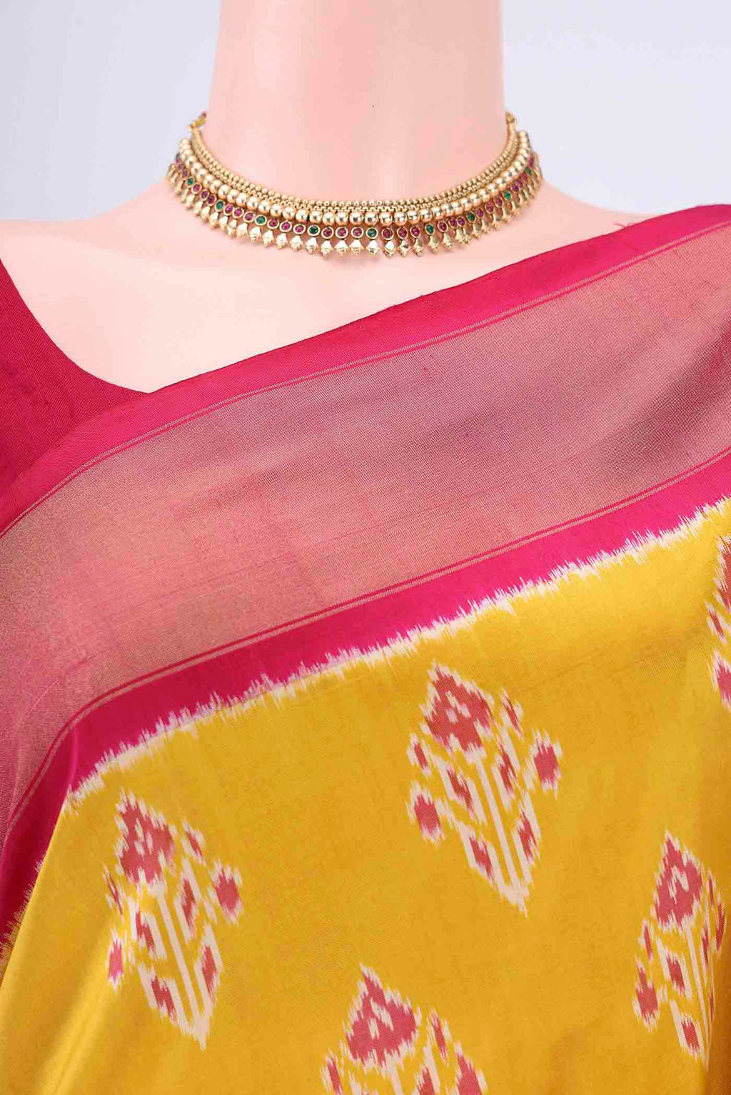 Border image of Mustard Pochampally Silk Saree with Pure Ikat on the body and Zari Border. 