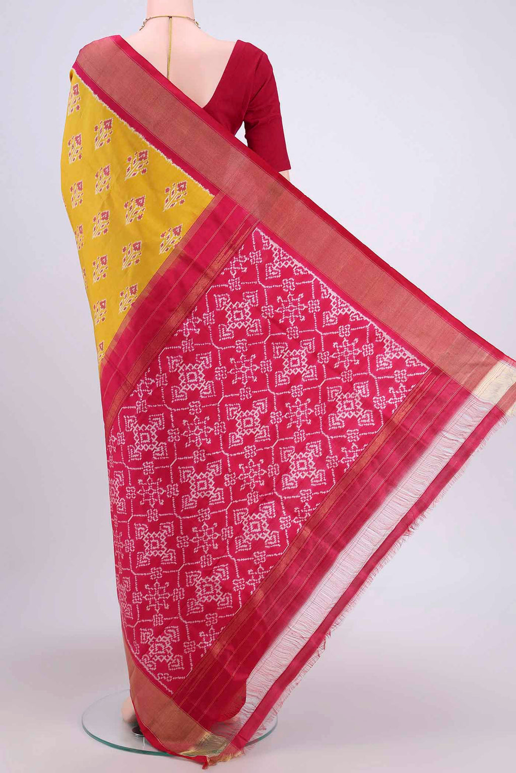 Flat view of Mustard Pochampally Silk Saree with Pure Ikat on the body and Zari Border. 