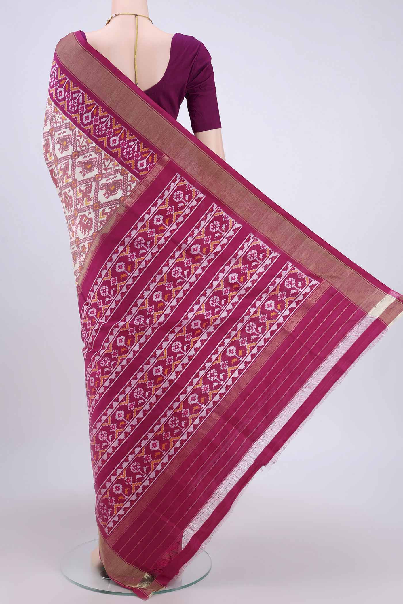 Flat view of Off White Pochampally Silk Saree with Pure Ikat on the body and Zari Border. 