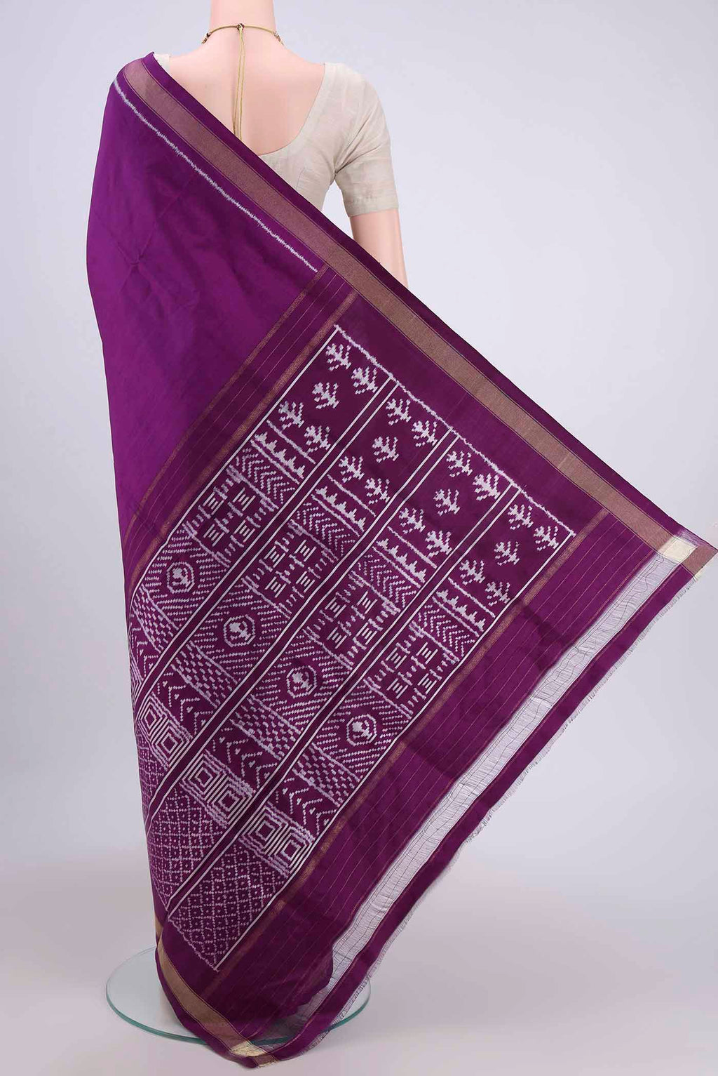 Flat view of Purple Pochampally Silk Saree with Pure Ikat on the body and Zari Border. 