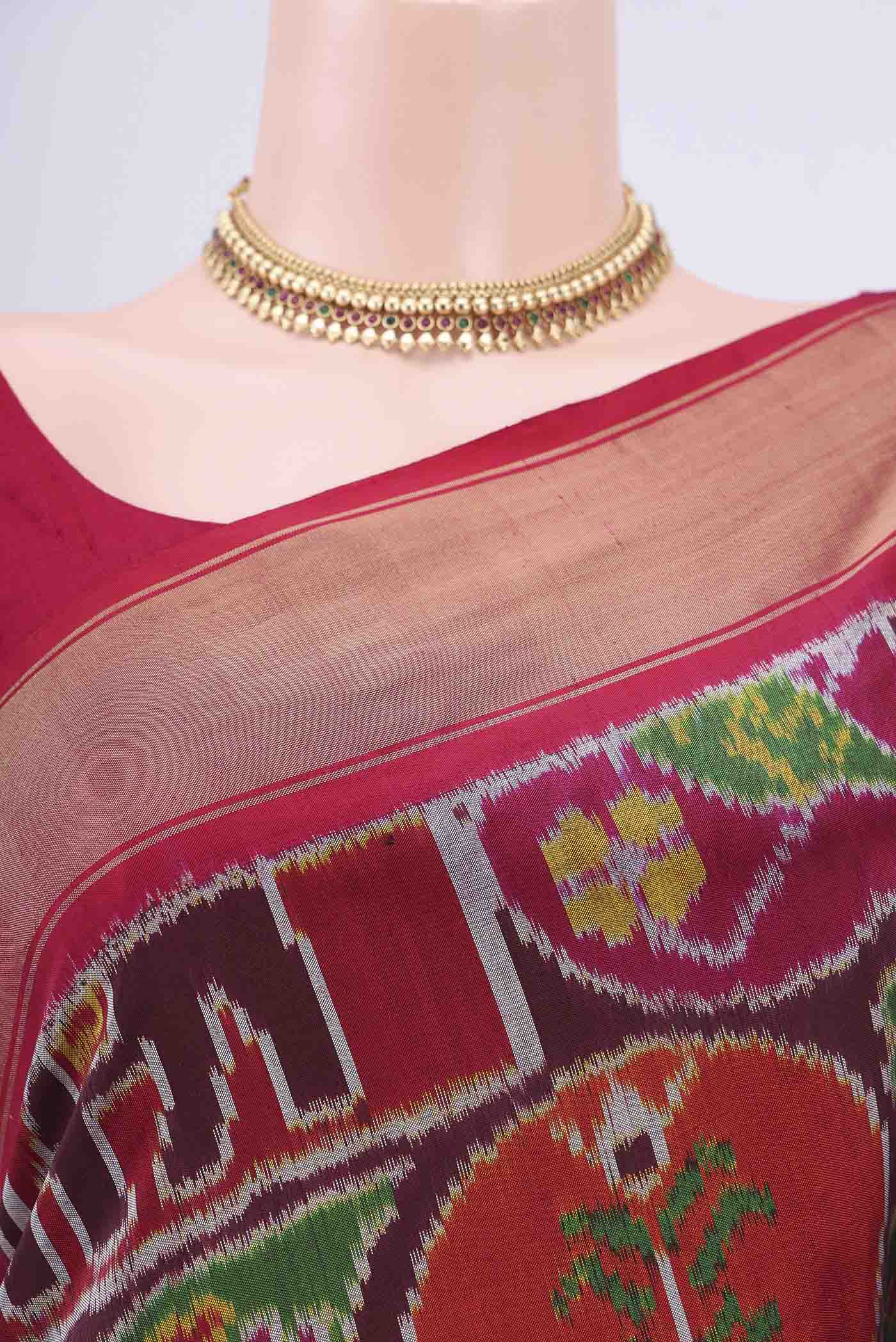Border image of Brown Pochampally Silk Saree with Pure Ikat on the body and Zari Border. 