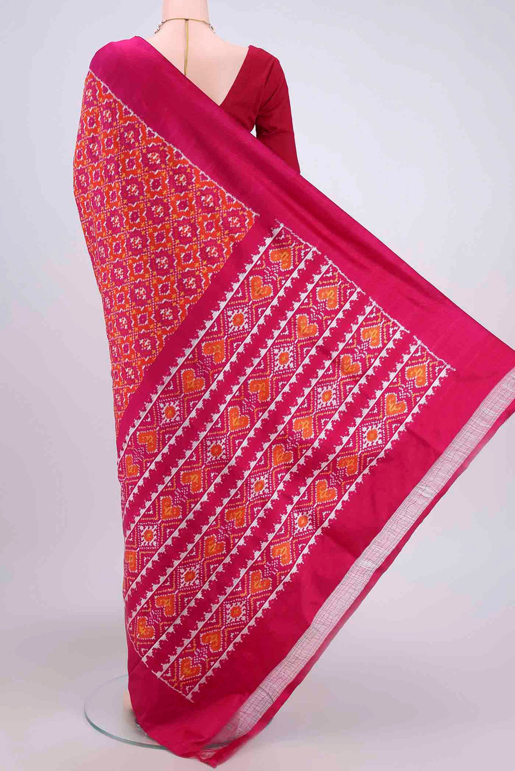 Flat view of Rust Pochampally Silk Saree with Pure Ikat on the body and Plain Border. 
