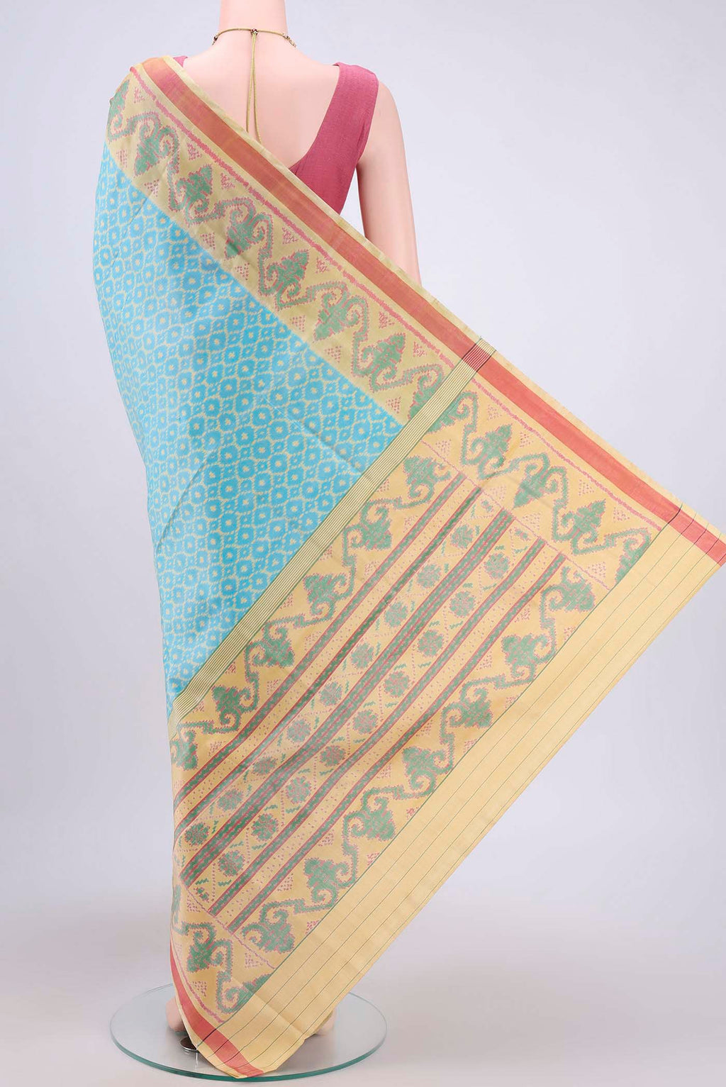 Flat view of Sky Blue Rajkot Patola Silk Saree with Pure Ikat on the body and Fancy Border. 