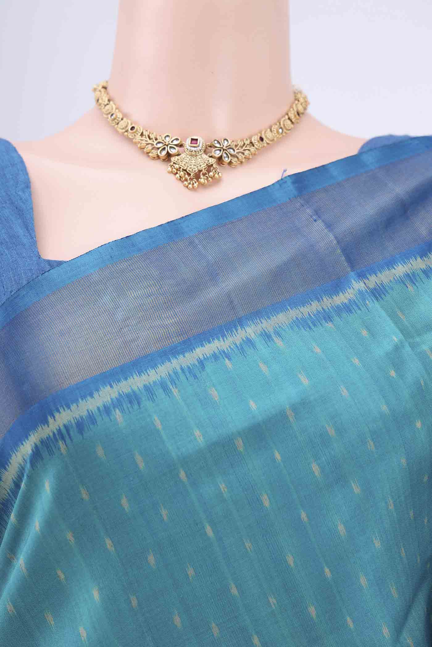 Border image of Sea Green Rajkot Patola Silk Saree with Pure Ikat on the body and Zari Border. 