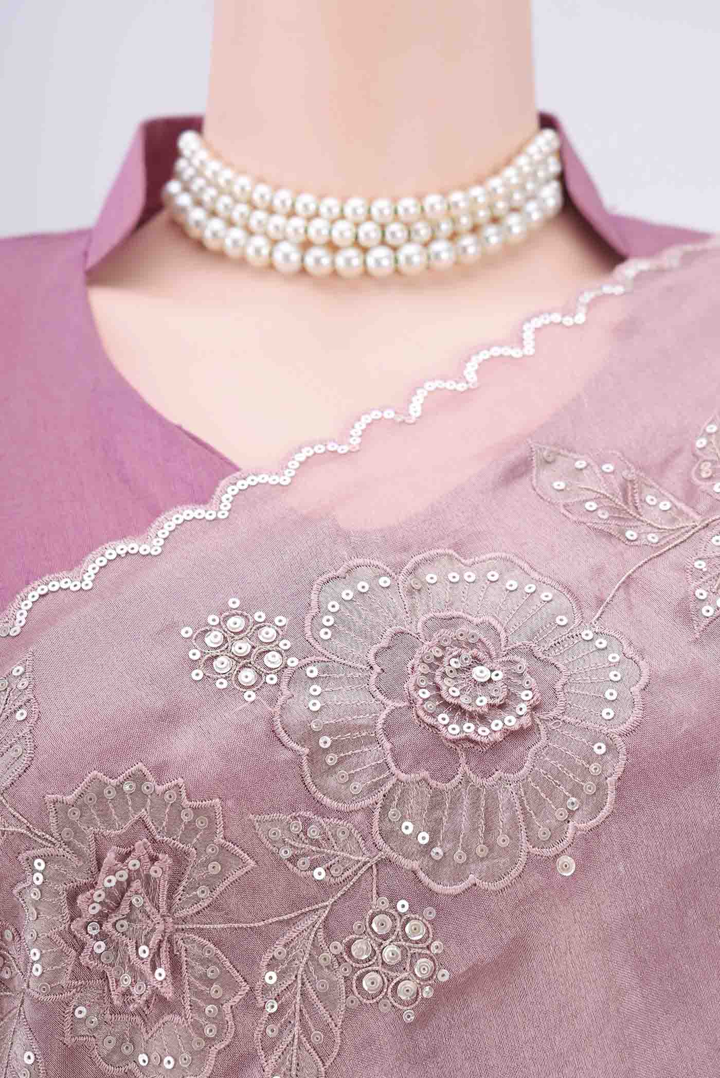 Border image of Rose Gold Organza Silk Saree with Embroidery on the body and Zari Border. 