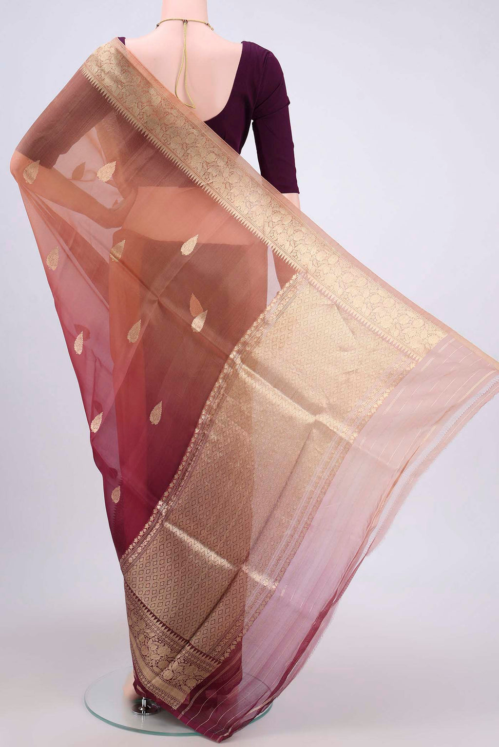 Flat view of Burgundy Organza Silk Saree with Half And Half on the body and Zari Border. 