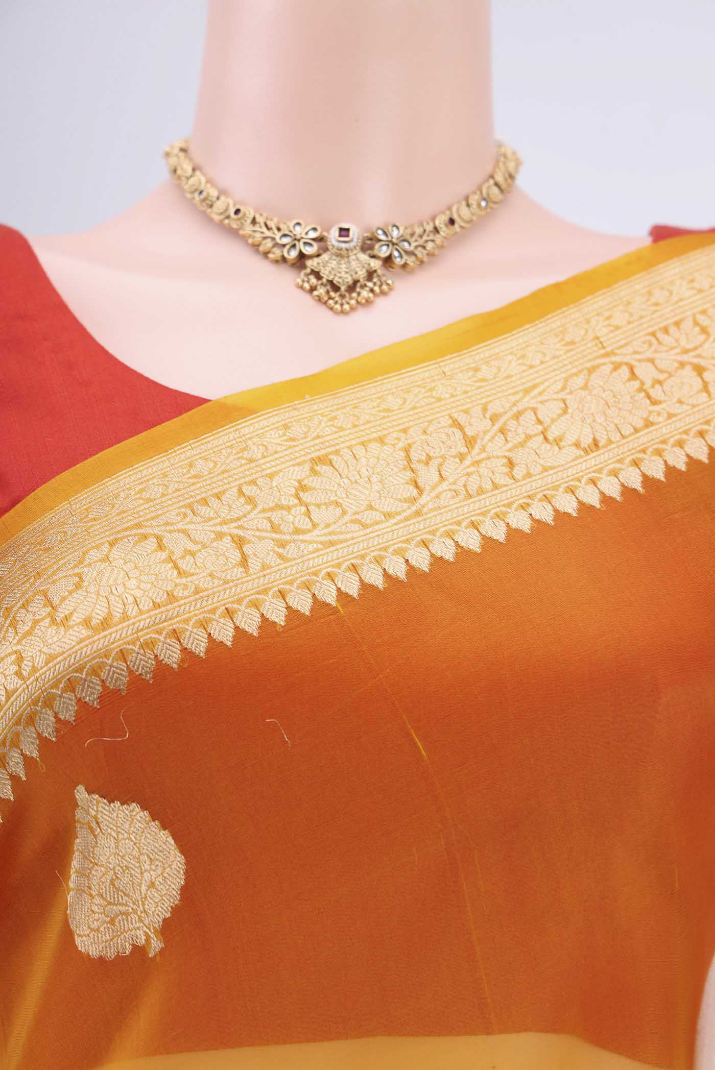 Border image of Rust Organza Silk Saree with Half And Half on the body and Zari Border. 
