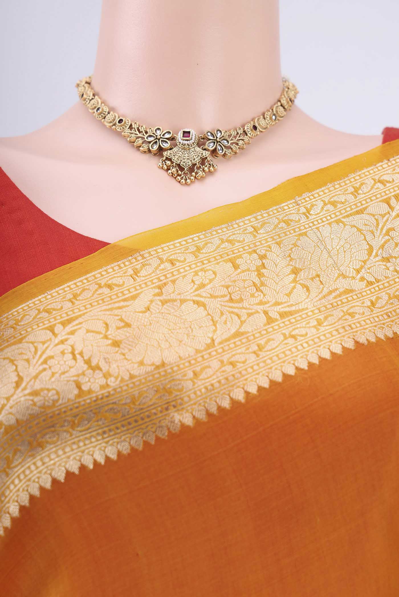 Border image of Rust Organza Silk Saree with Half And Half on the body and Zari Border. 