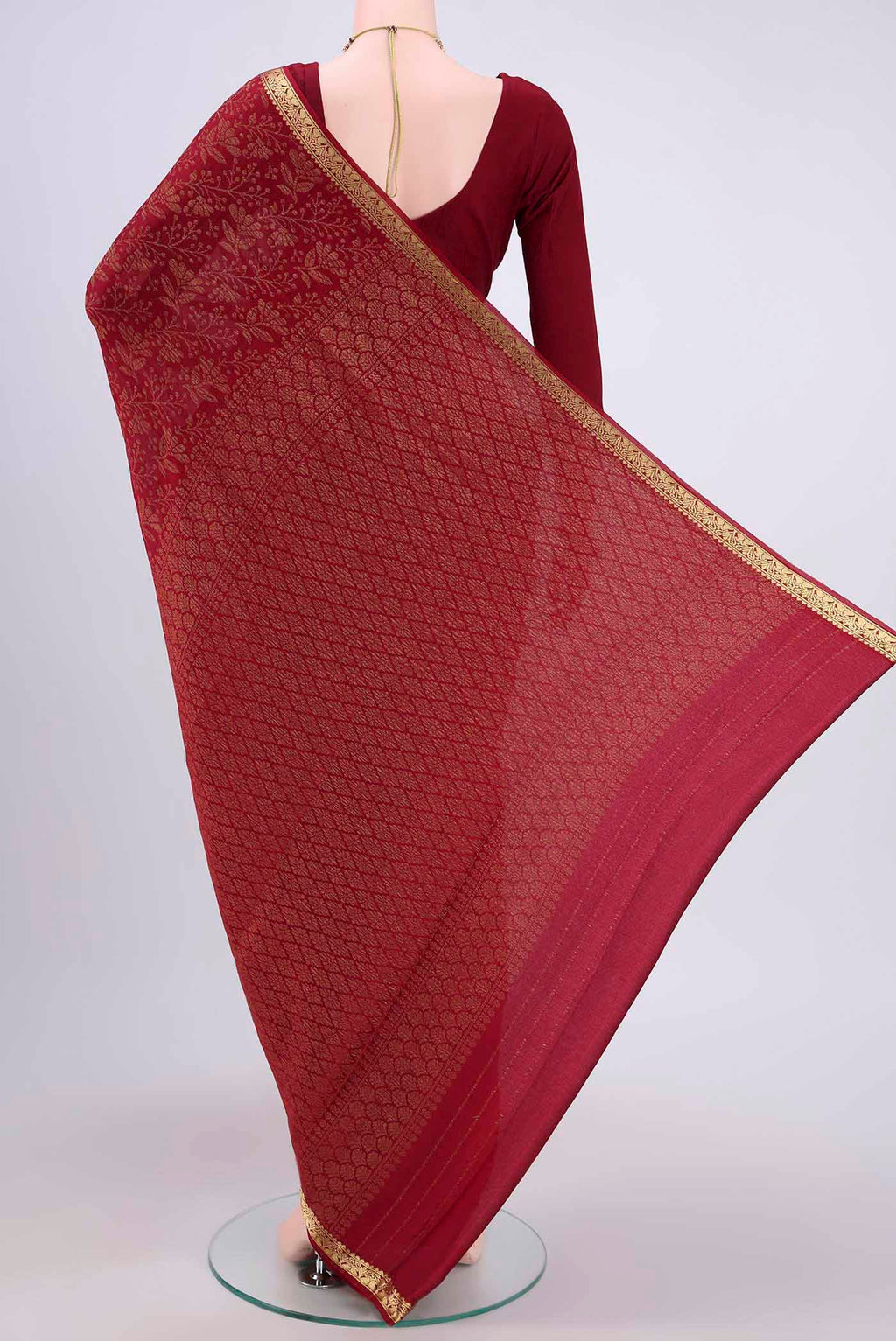 Flat view of Maroon Mysore Crepe Saree with Zari Brocade on the body and Zari Border. 