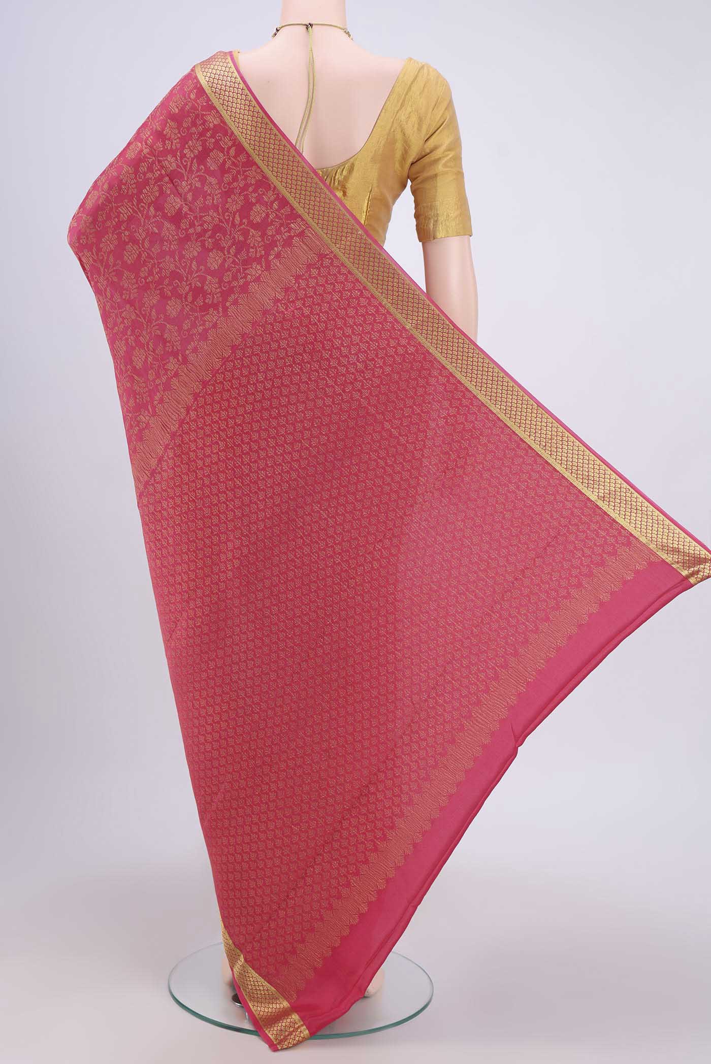 Flat view of Pink Mysore Crepe Saree with Zari Brocade on the body and Zari Border. 