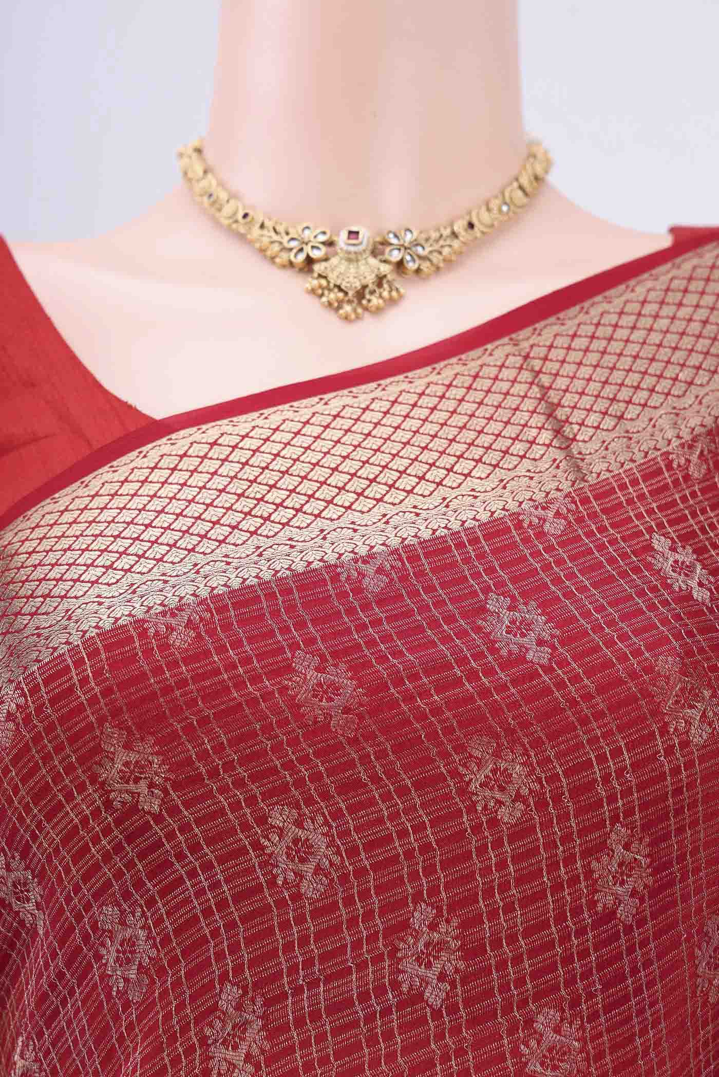 Border image of Red Mysore Crepe Saree with Zari Brocade on the body and Zari Border. 