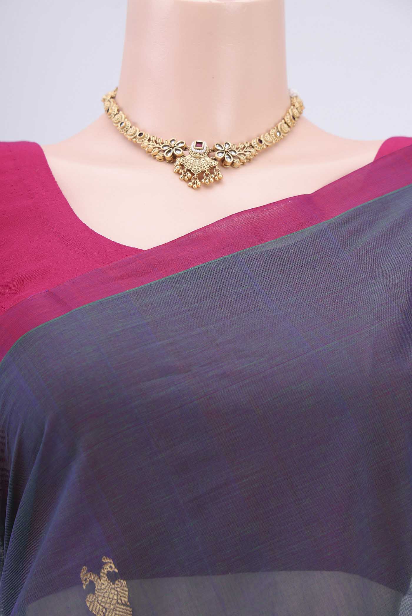 Border image of Bottle Green Kanchi Cotton Saree with Zari Butta on the body and Zari Border. 