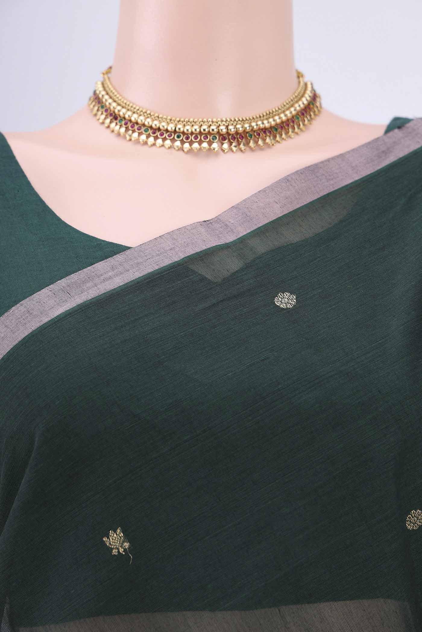 Border image of Bottle Green Kanchi Cotton Saree with Zari Butta on the body and Zari Border. 